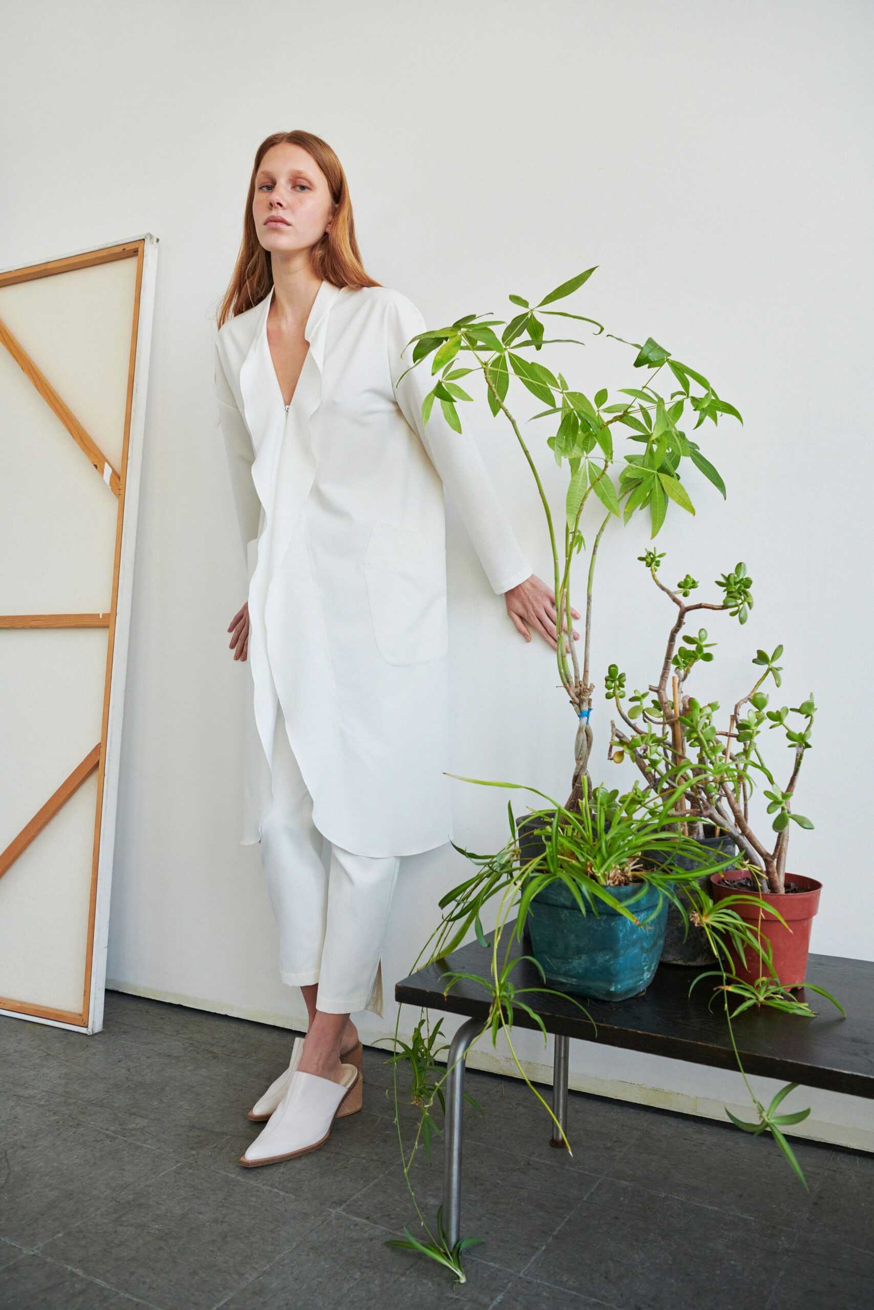 white relaxed coat with tailored pants