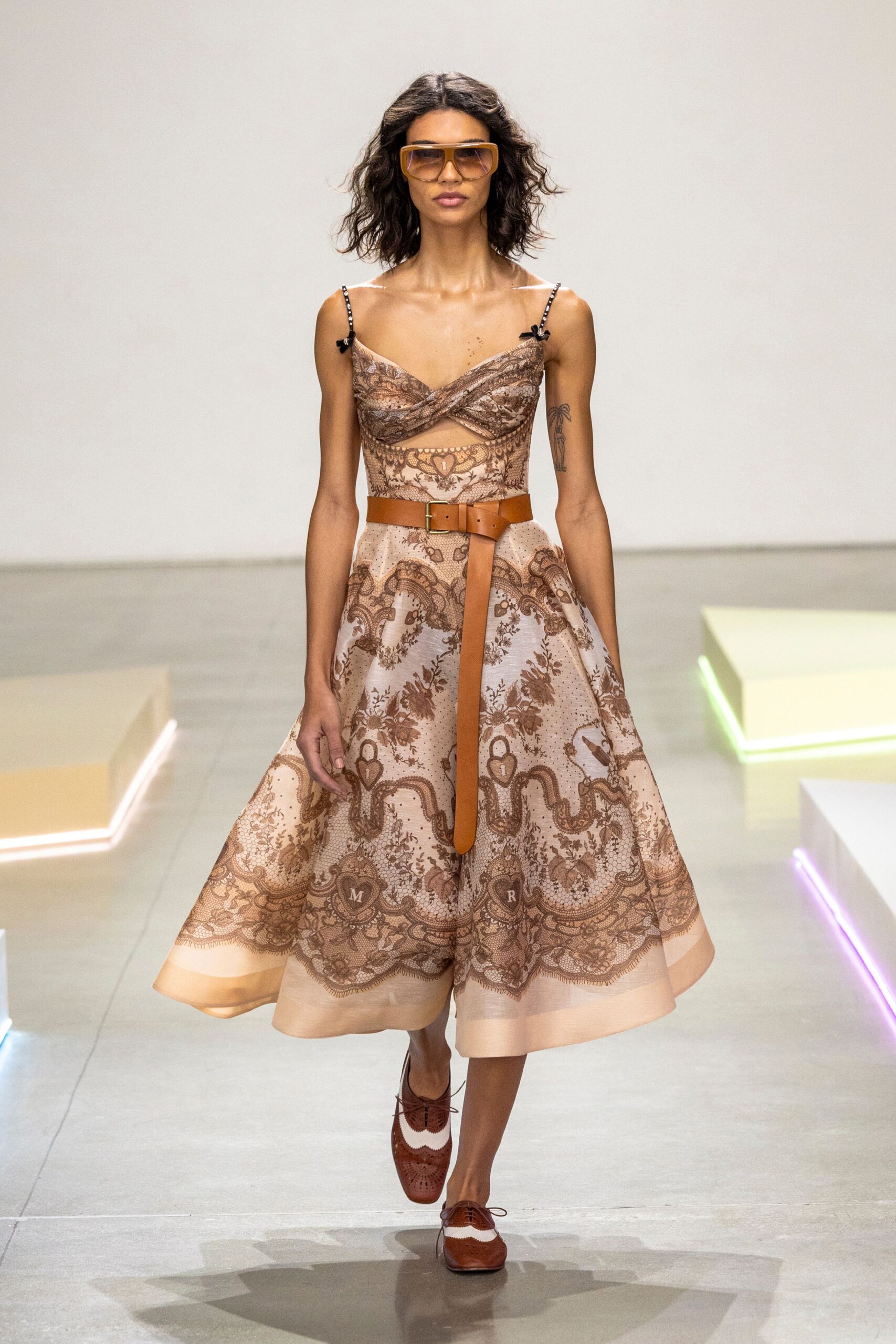 brown silk sleeveless v-neck fitted flared printed dress