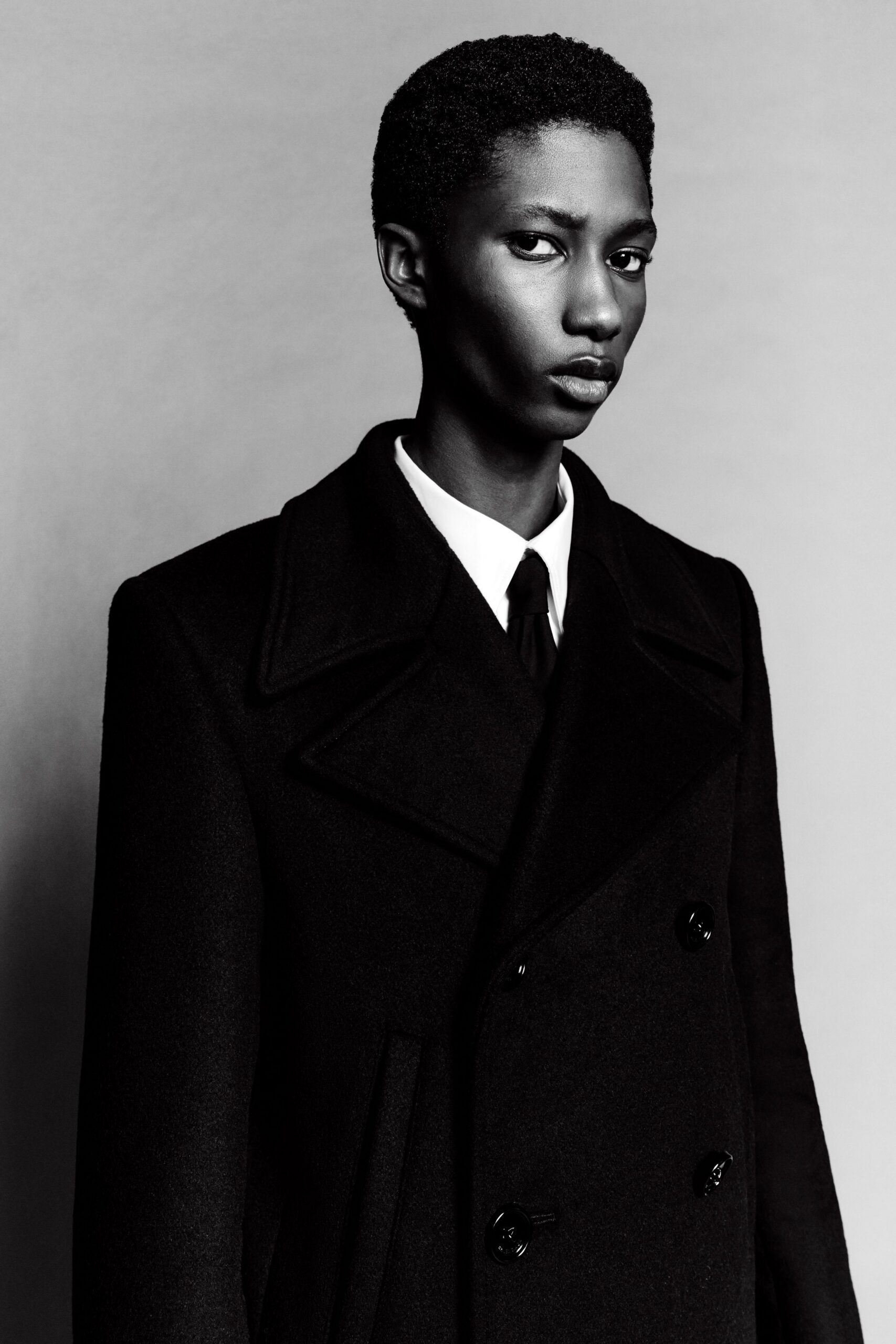 black wool long-sleeve collared structured coat