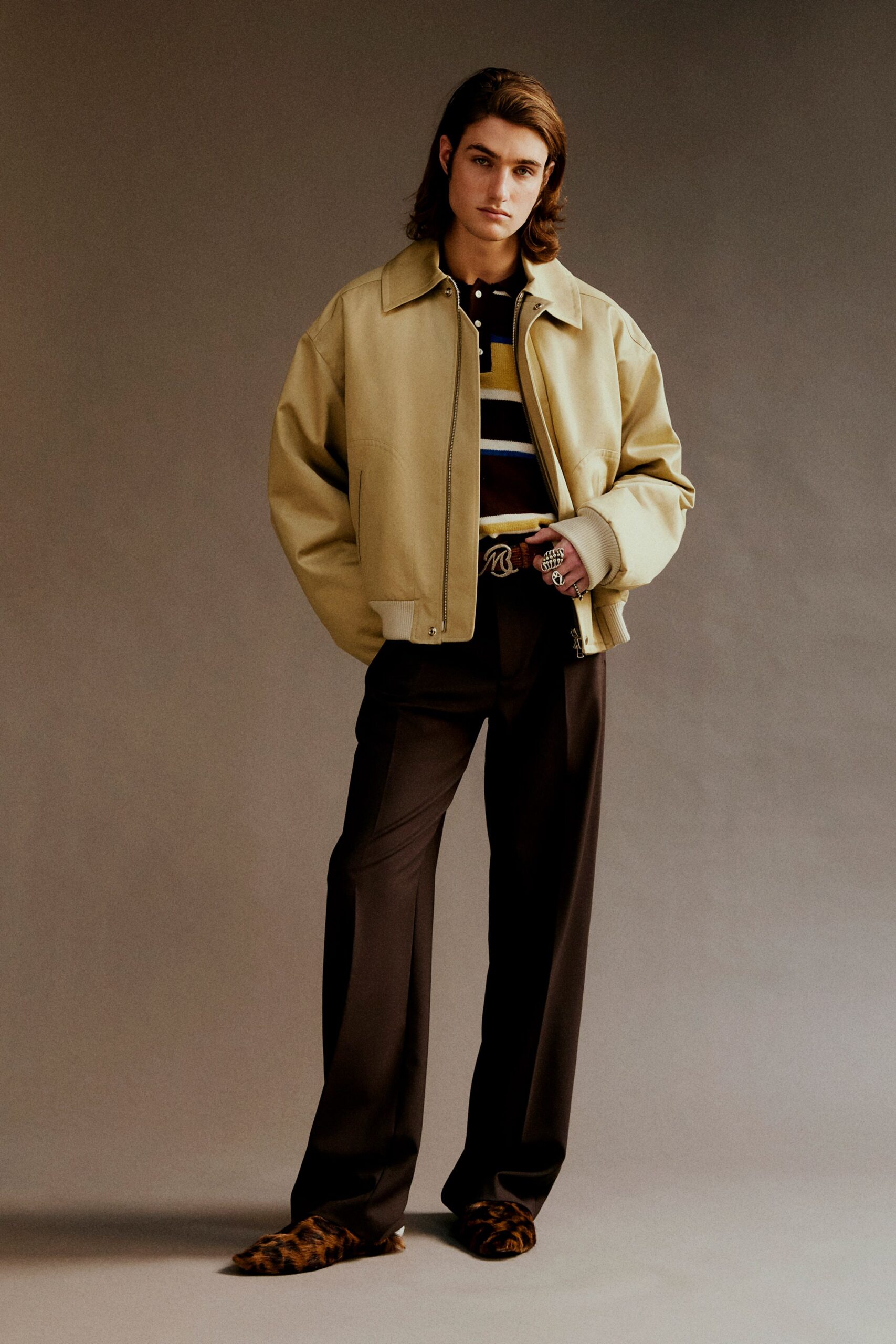 beige oversized jacket with striped shirt