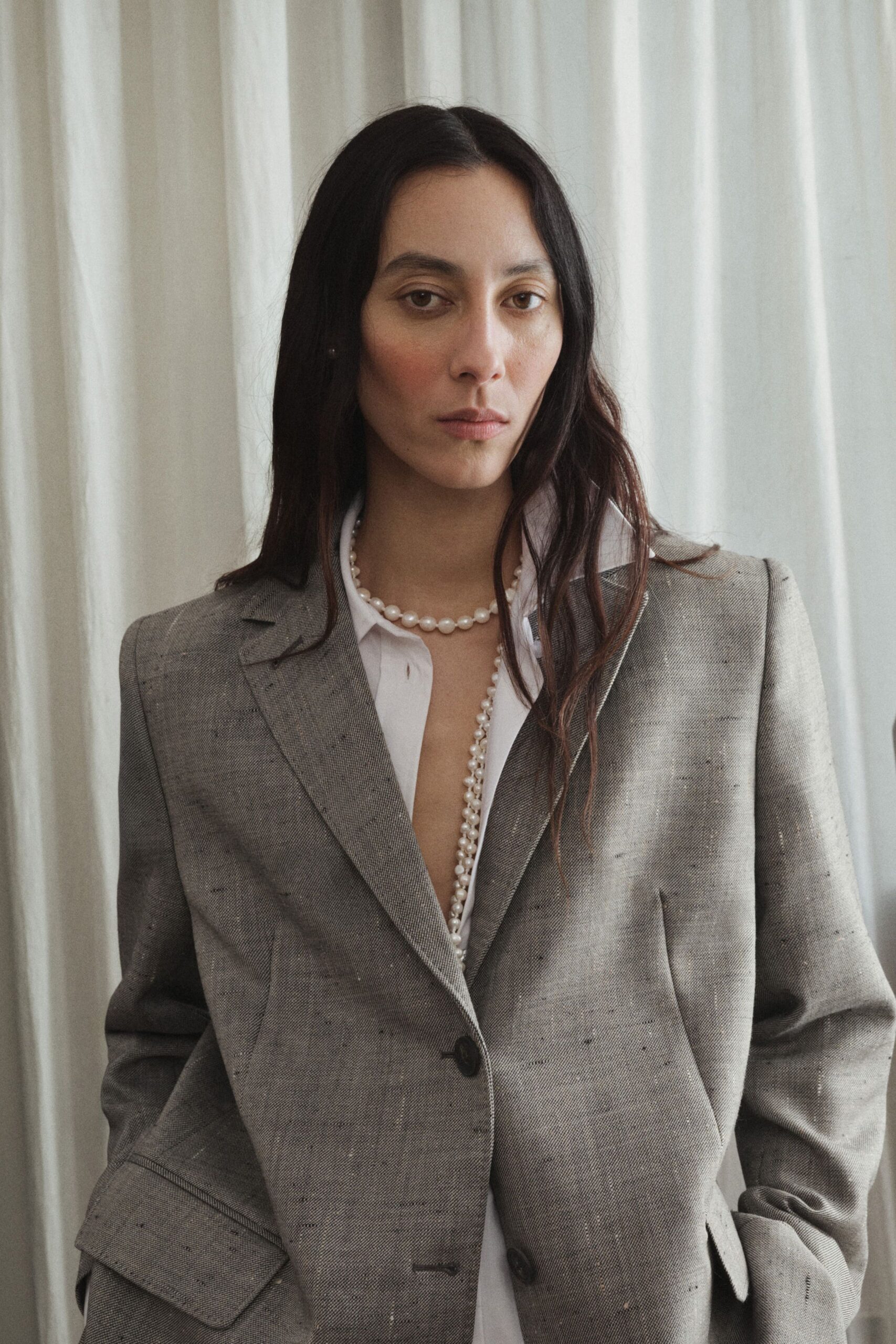 gray structured blazer and white shirt