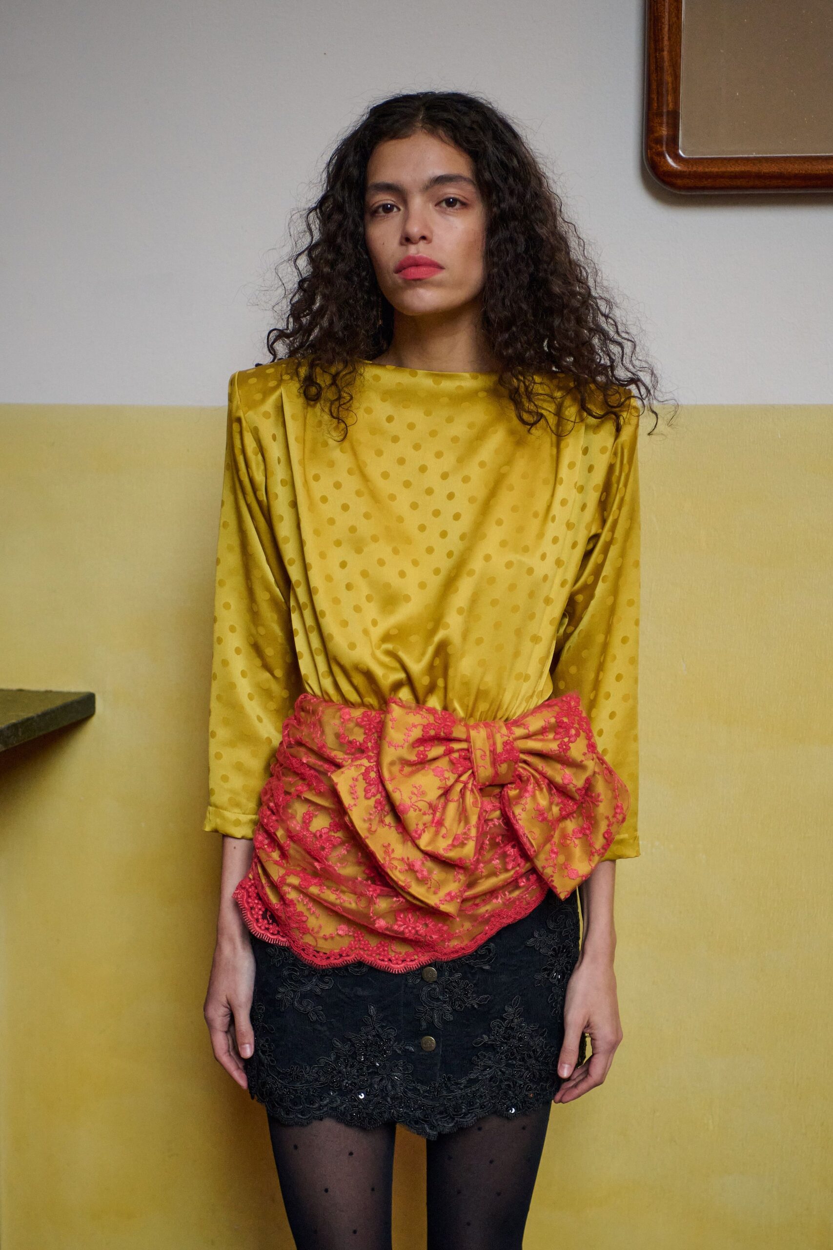 yellow silk long-sleeve high-neck fitted polka-dot ruffled top