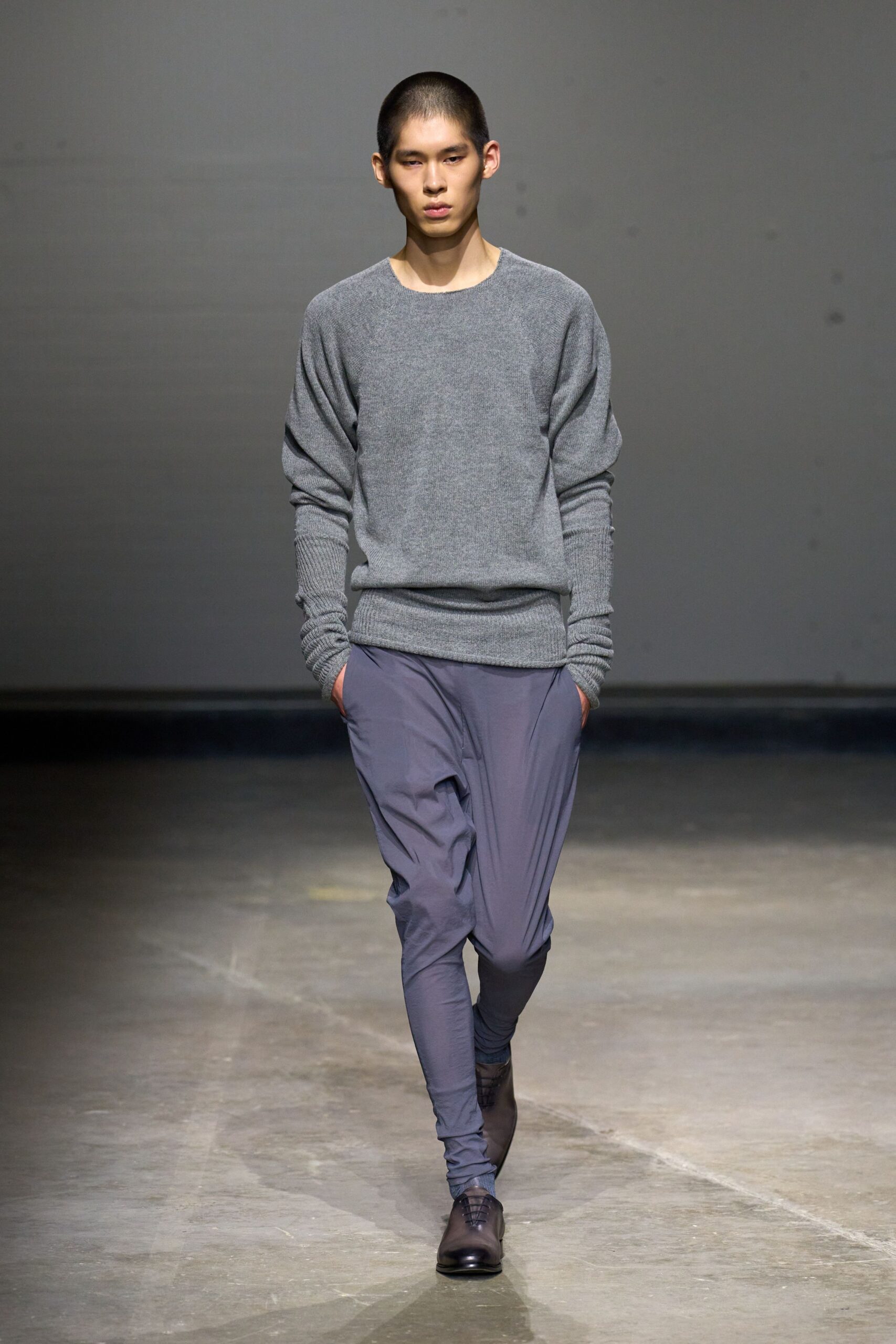 gray sweater blue pants brown shoes