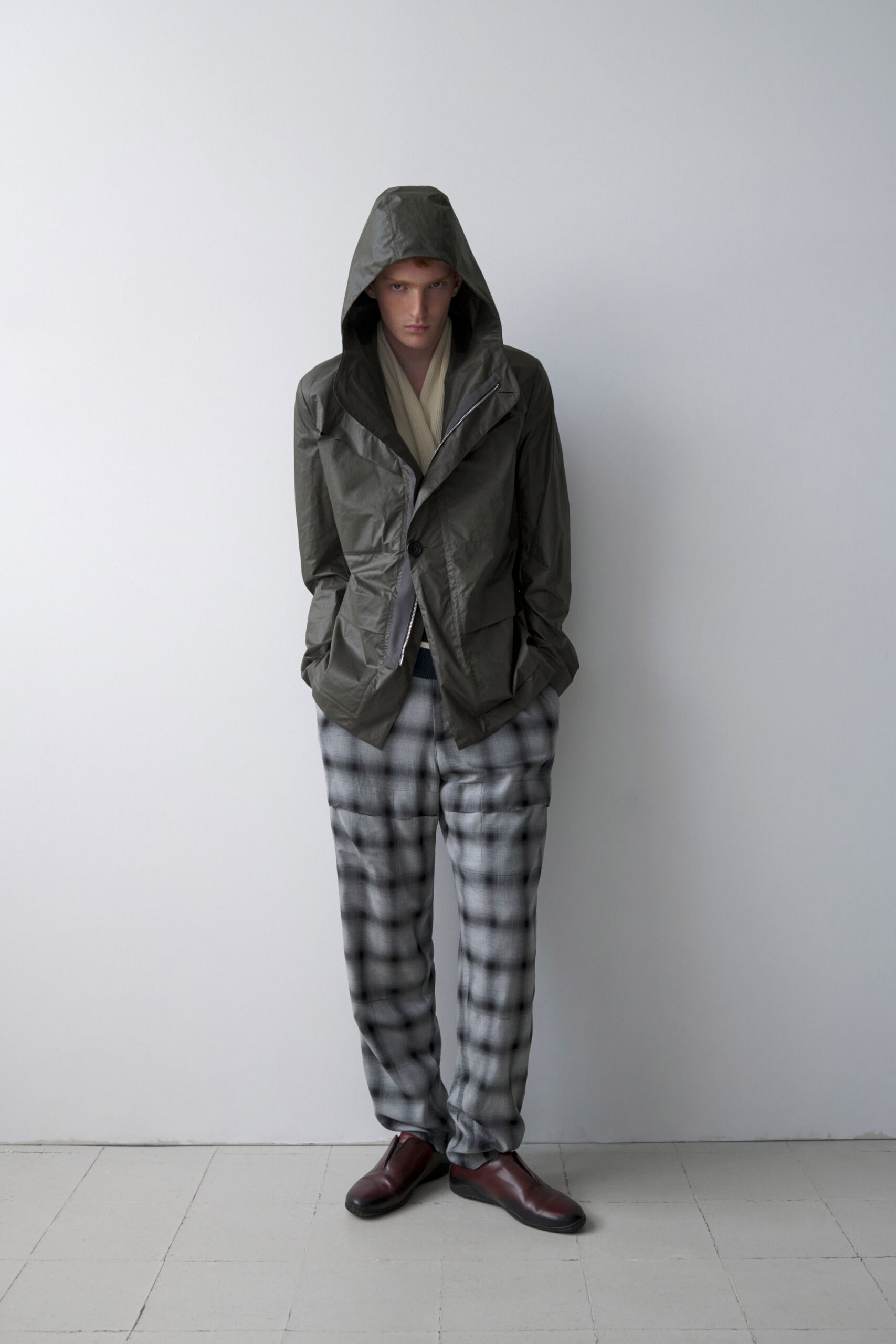green hooded jacket gray checked pants