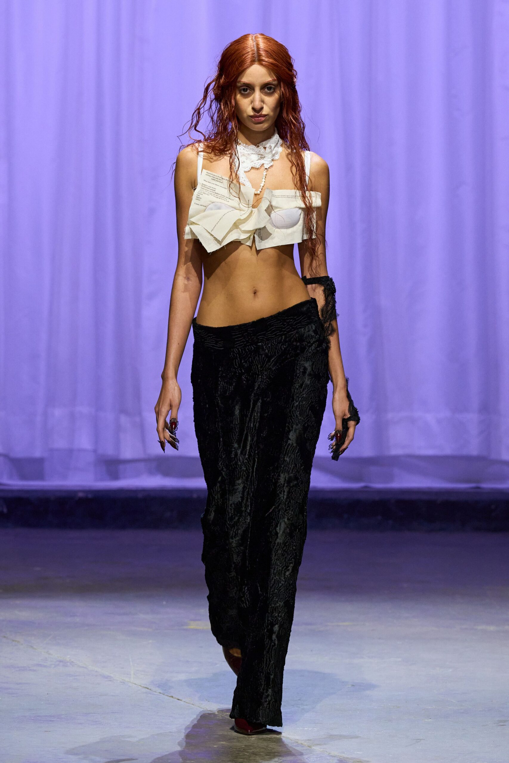 white ruffled top and black velvet pants