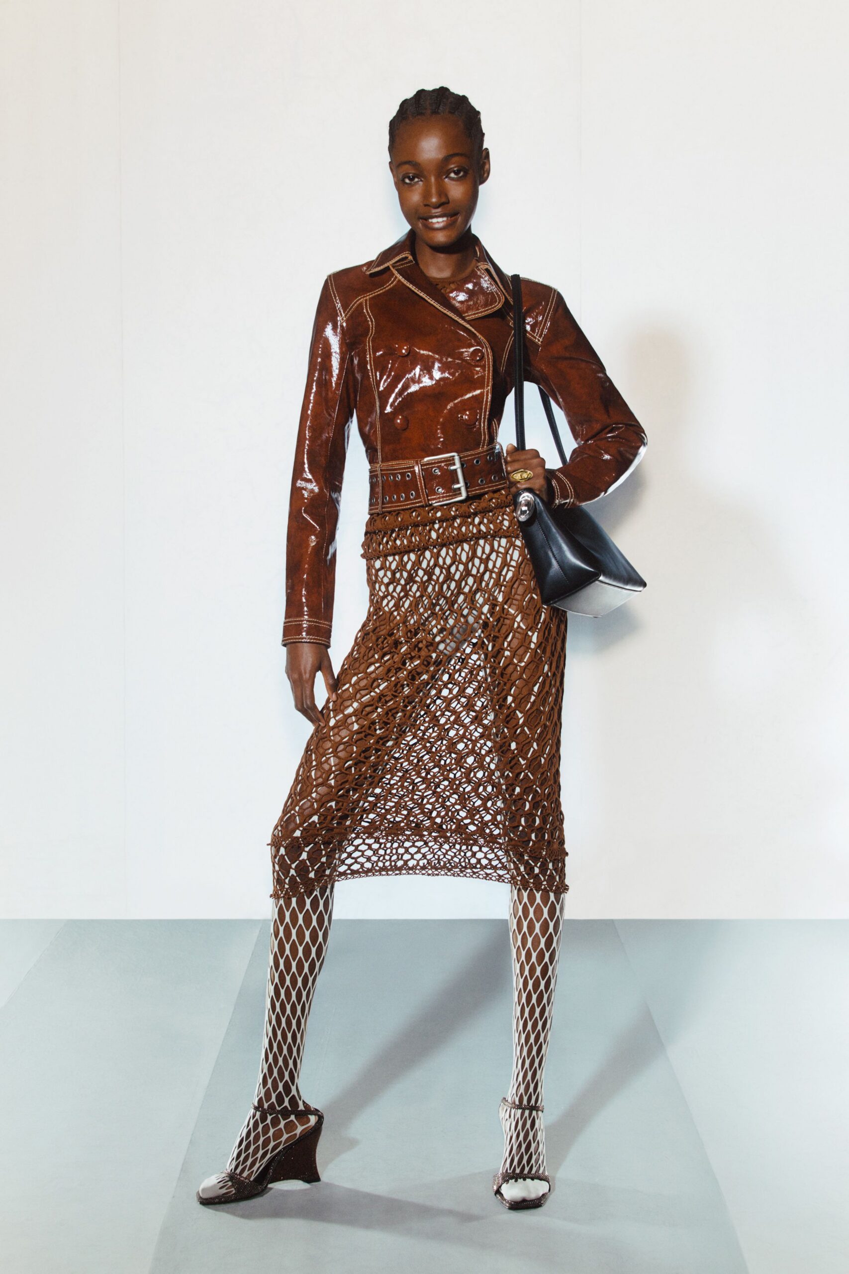 brown leather long-sleeve collared fitted zippered belted jacket