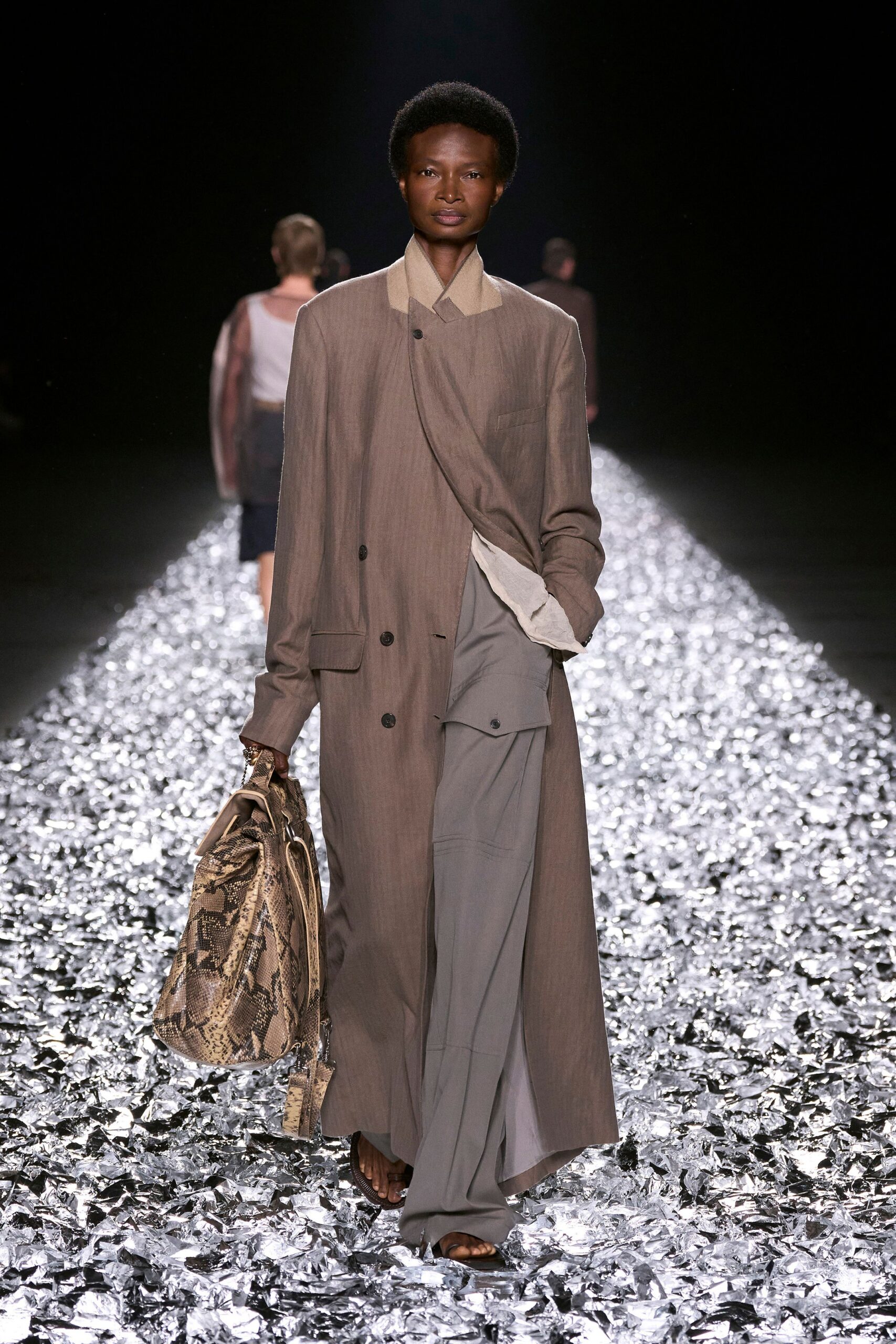 brown relaxed coat with gray pants