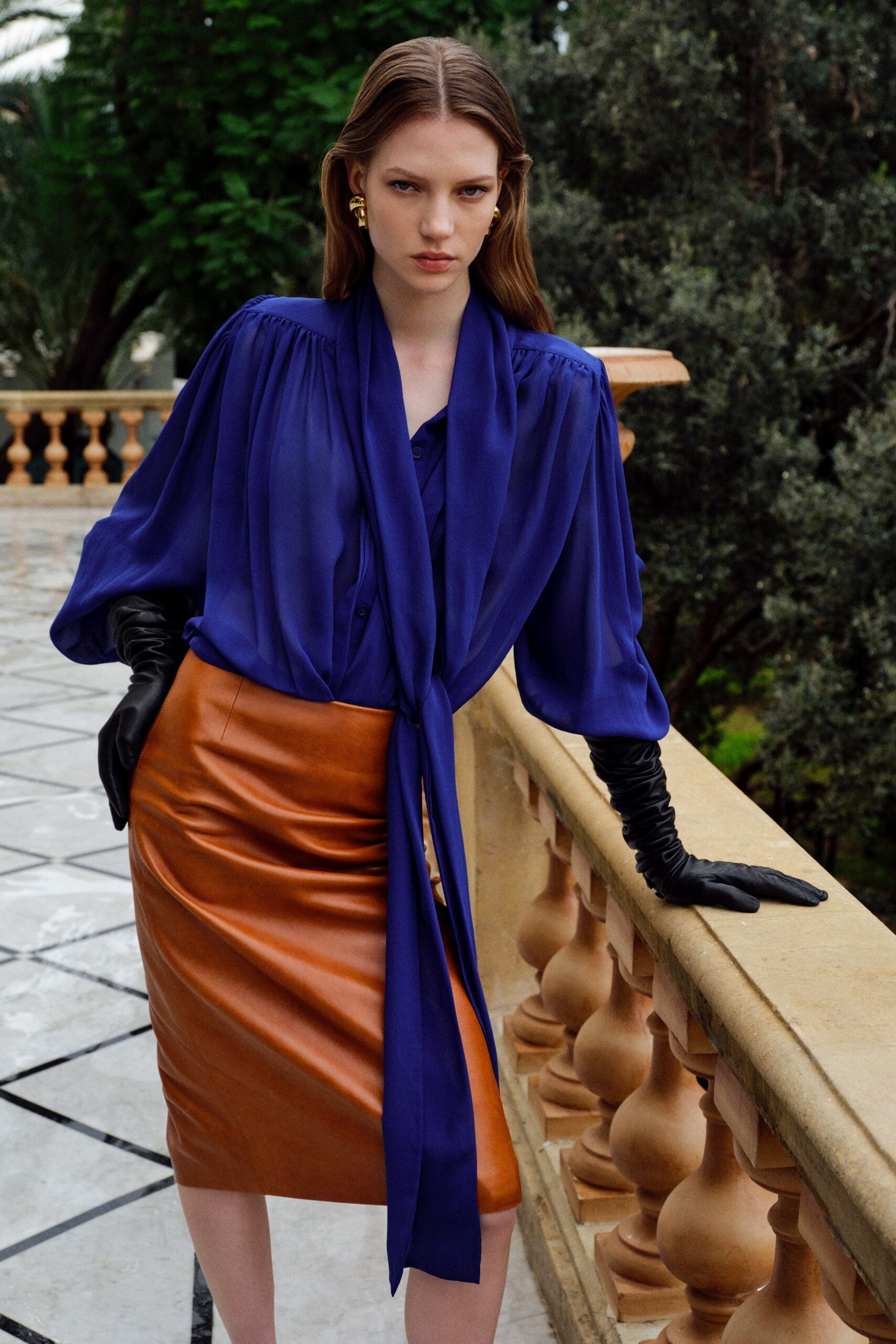 blue silk long-sleeve v-neck relaxed pleated flowing blouse