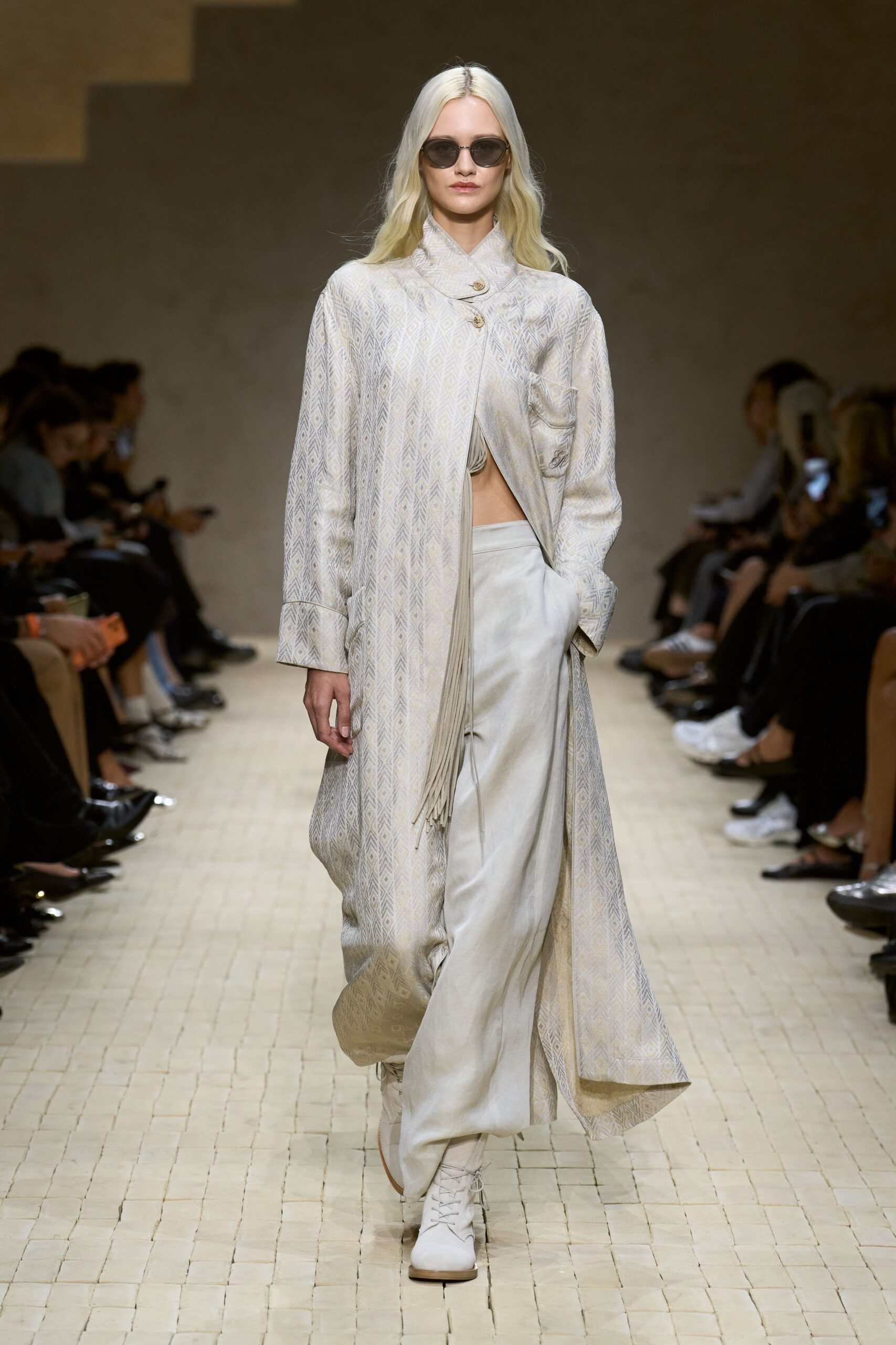 beige embroidered coat with white top