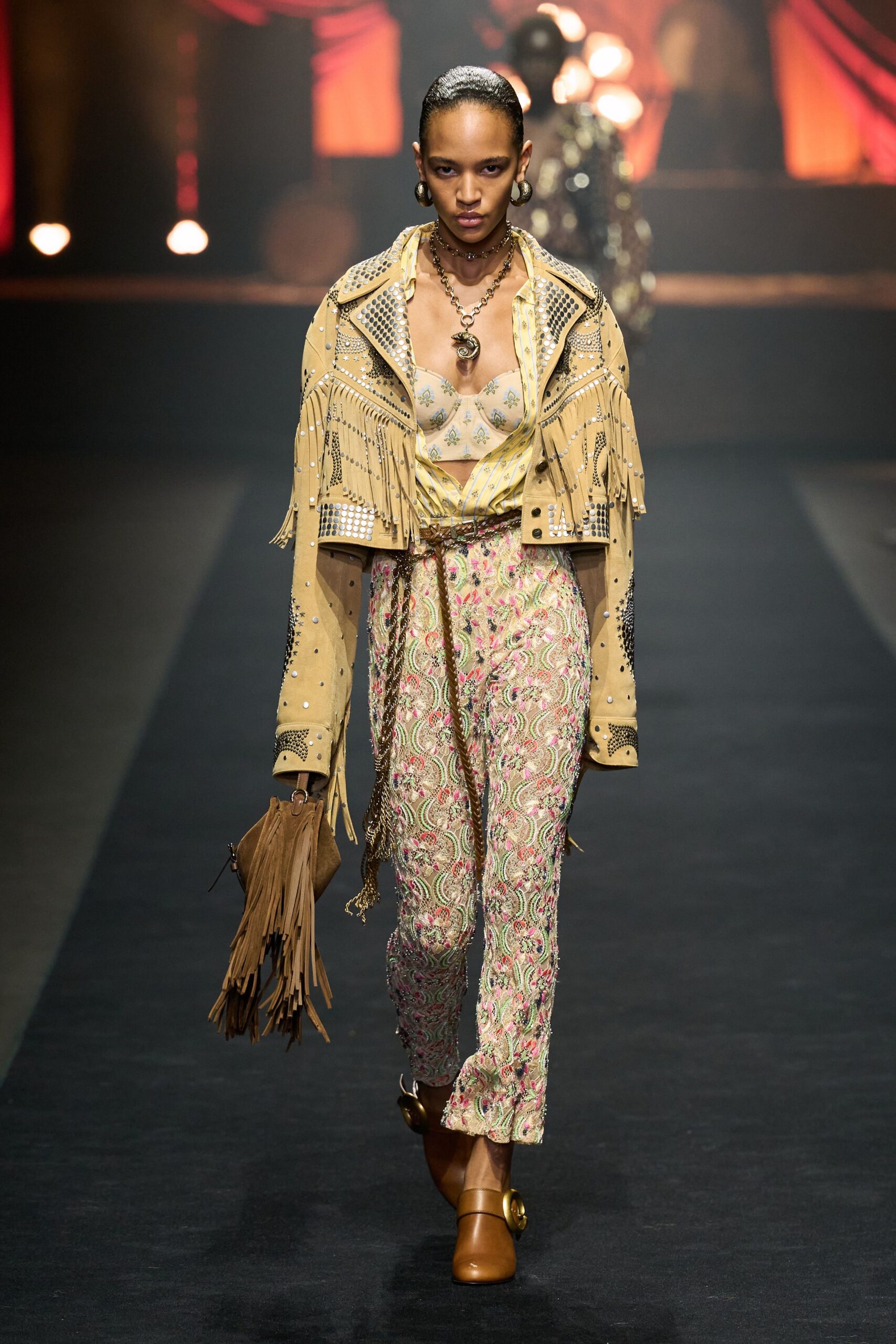 beige leather fringed jacket with multi pants