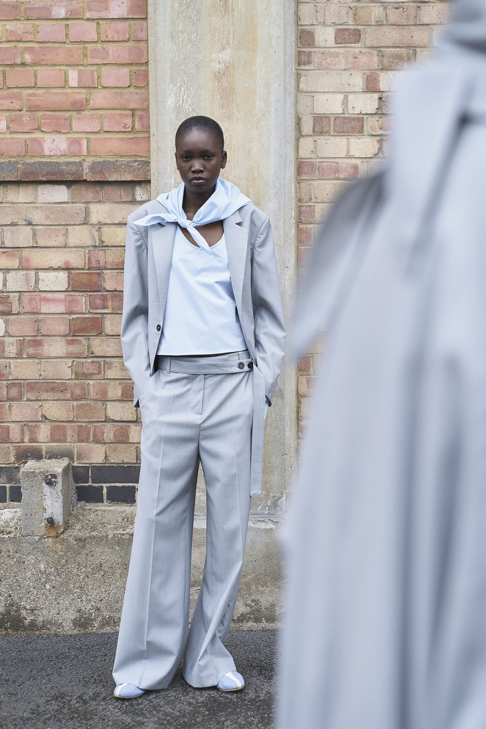 gray tailored blazer with light blue top