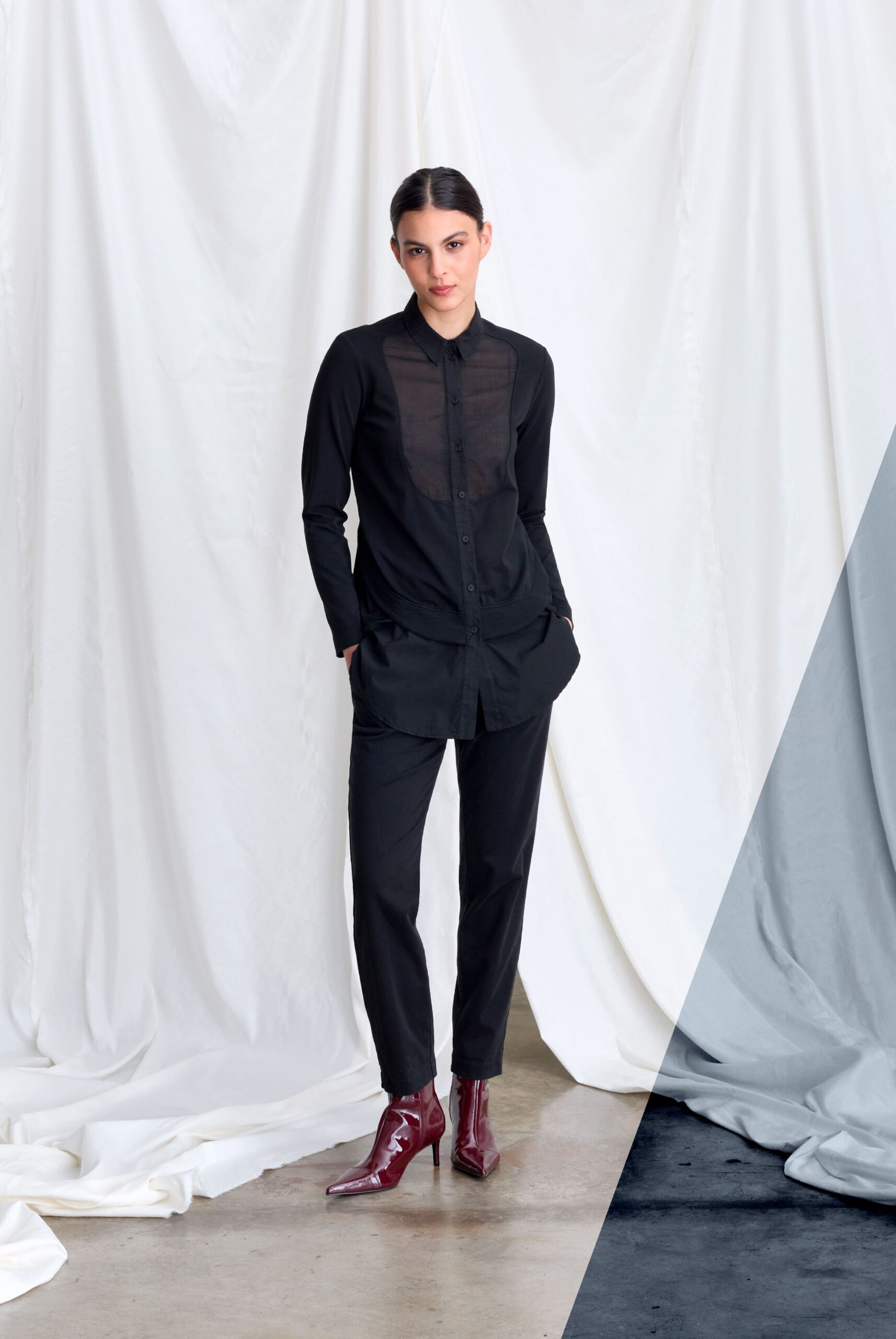 black fitted shirt and slim pants