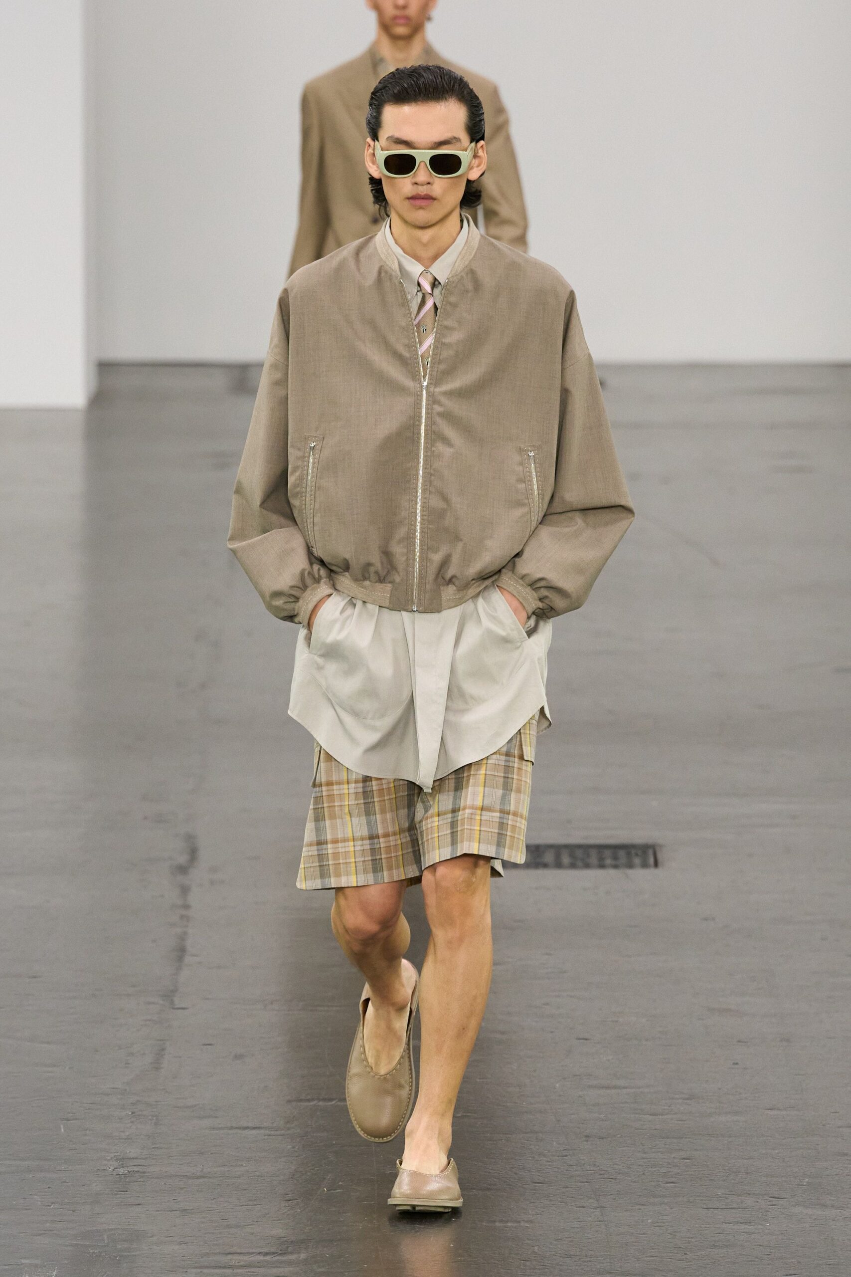beige relaxed jacket with plaid shorts