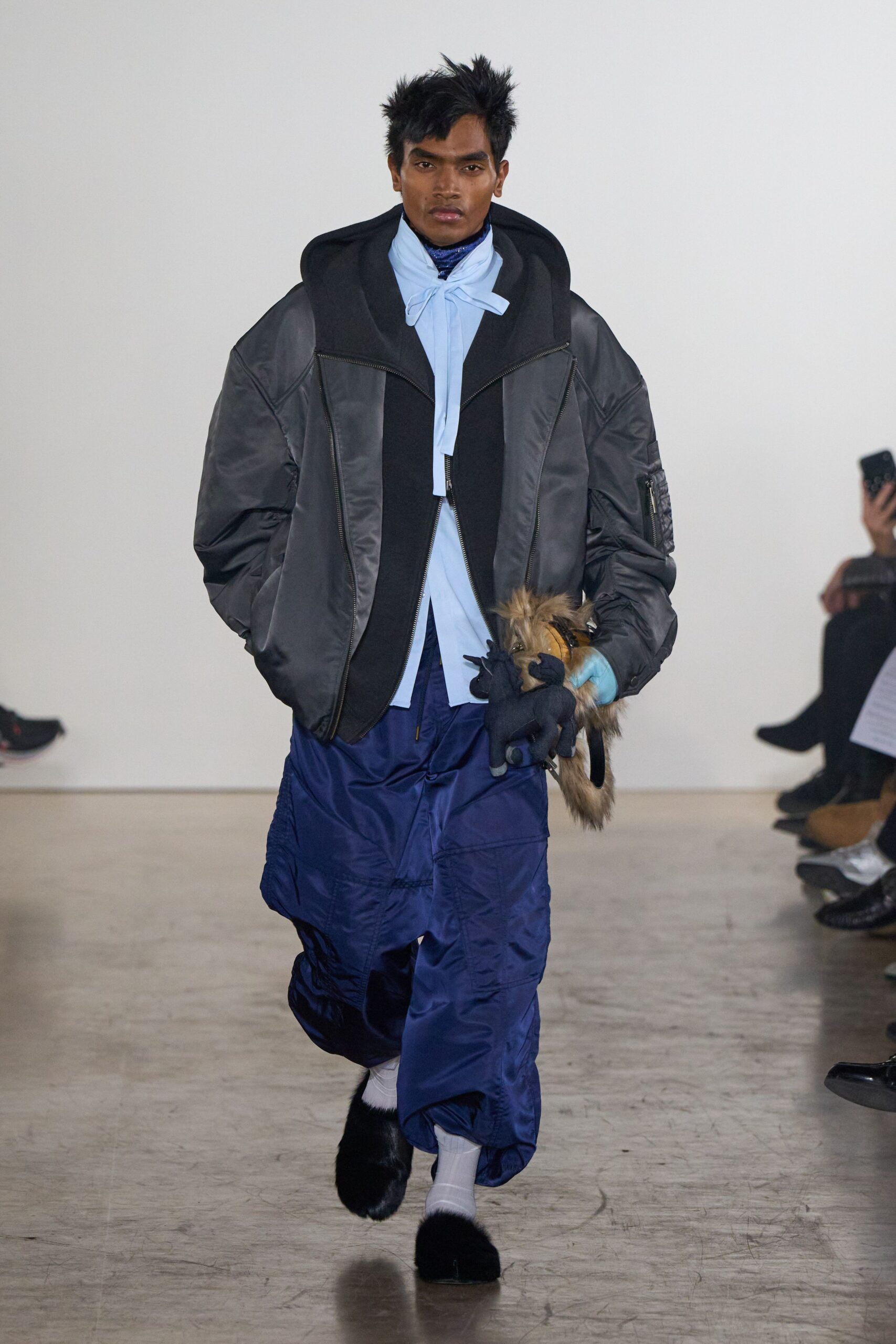 oversized gray jacket with blue shirt