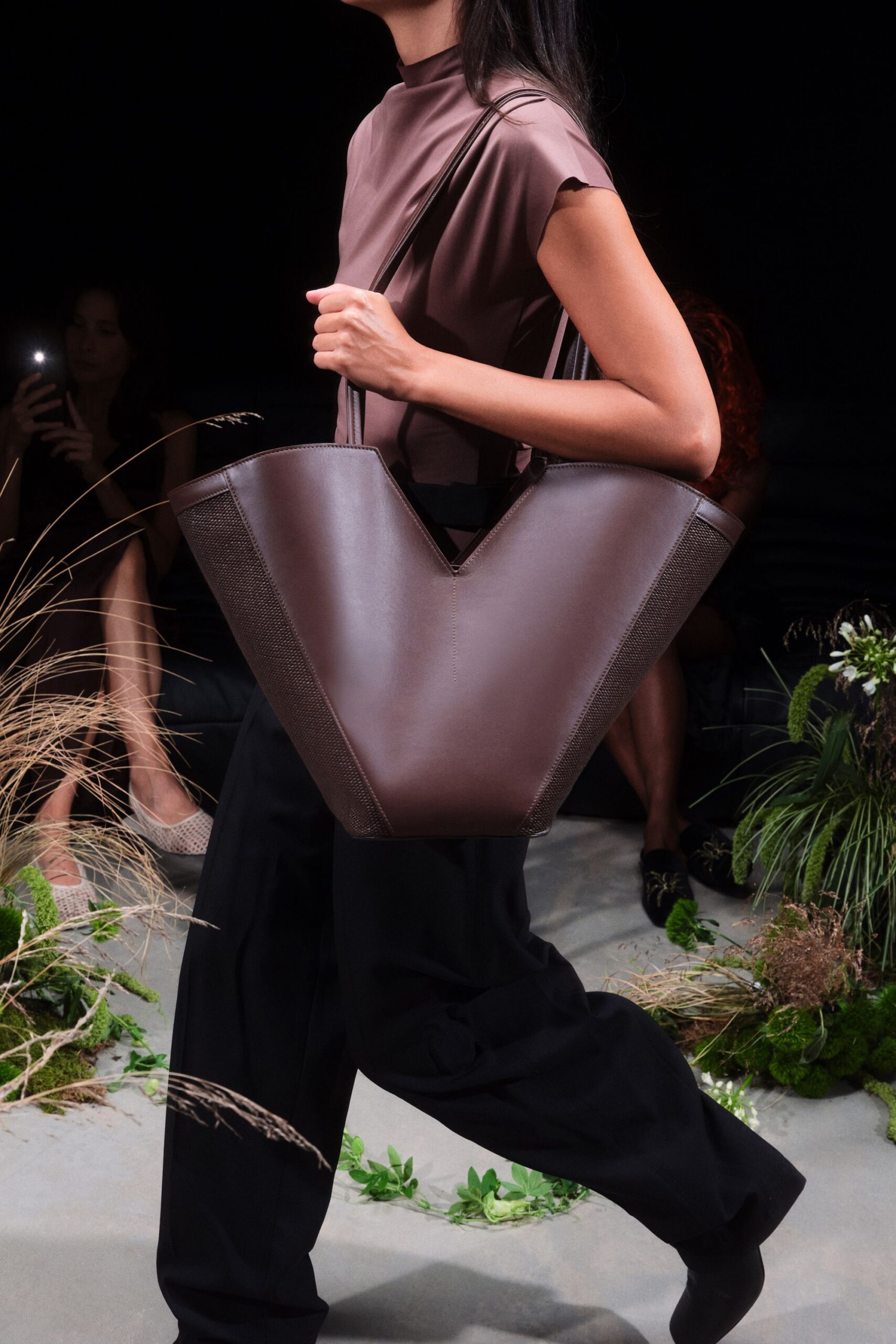 brown silk fitted top with black relaxed pants