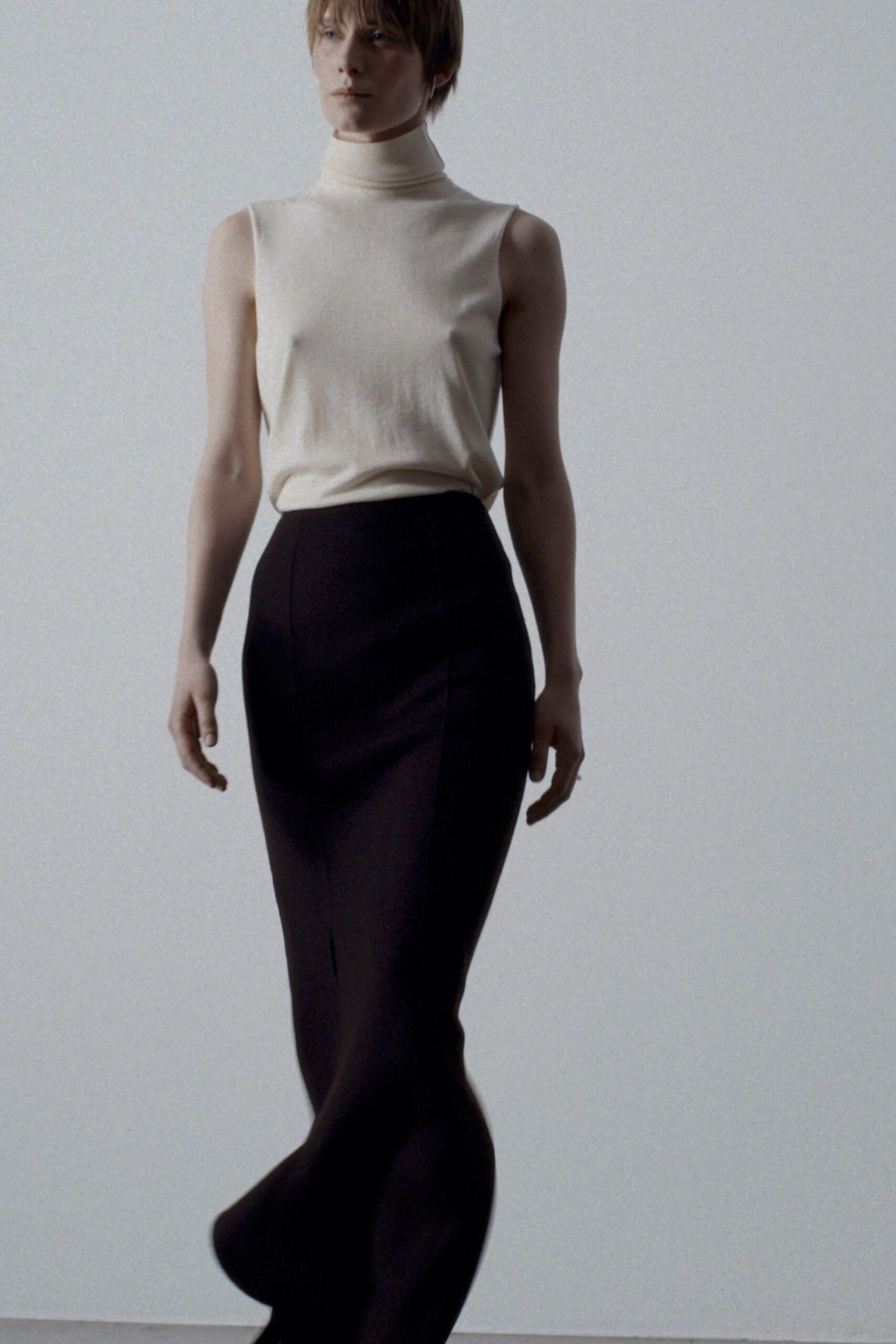 black wool fitted flared midi skirt