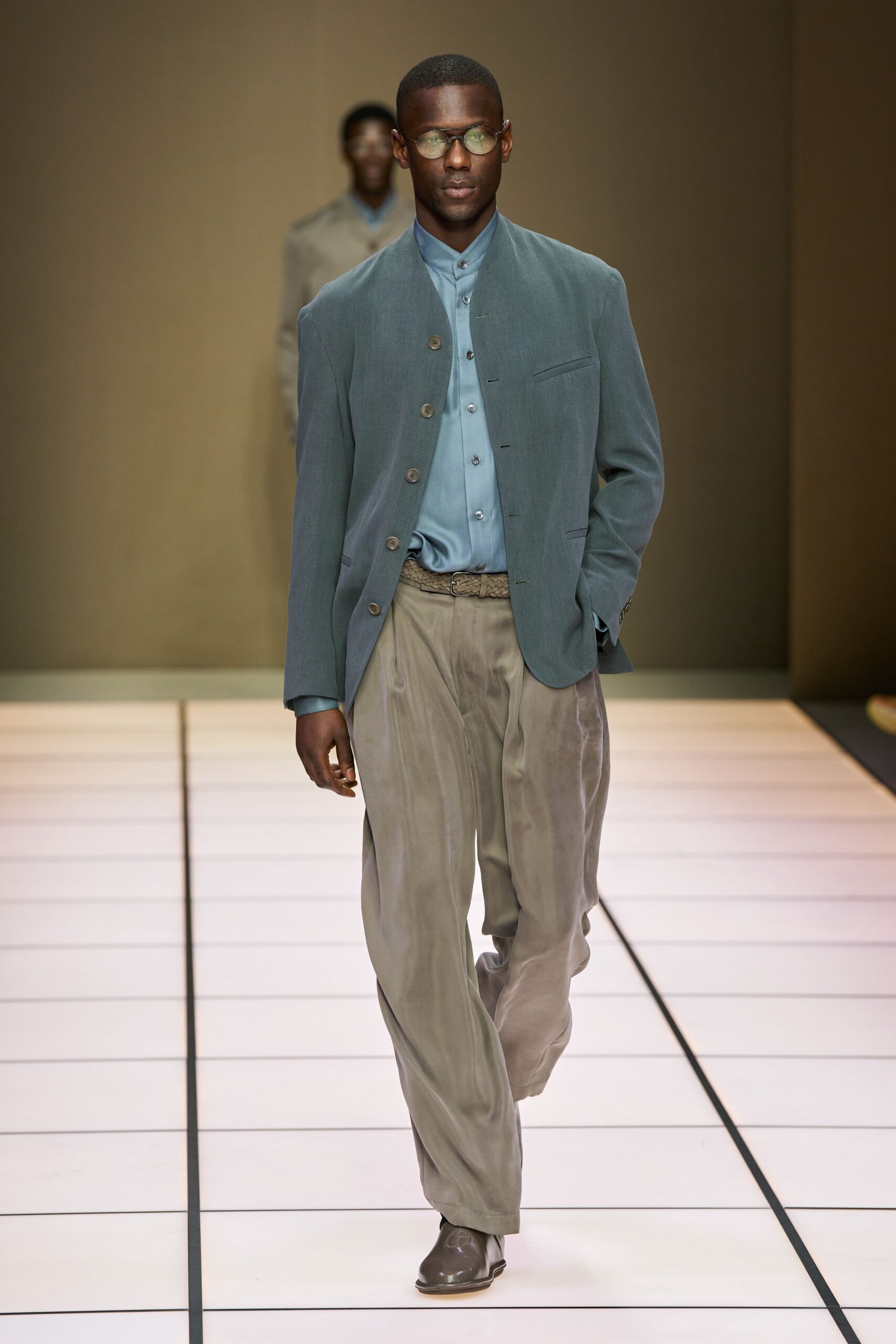 blue relaxed jacket with gray pants