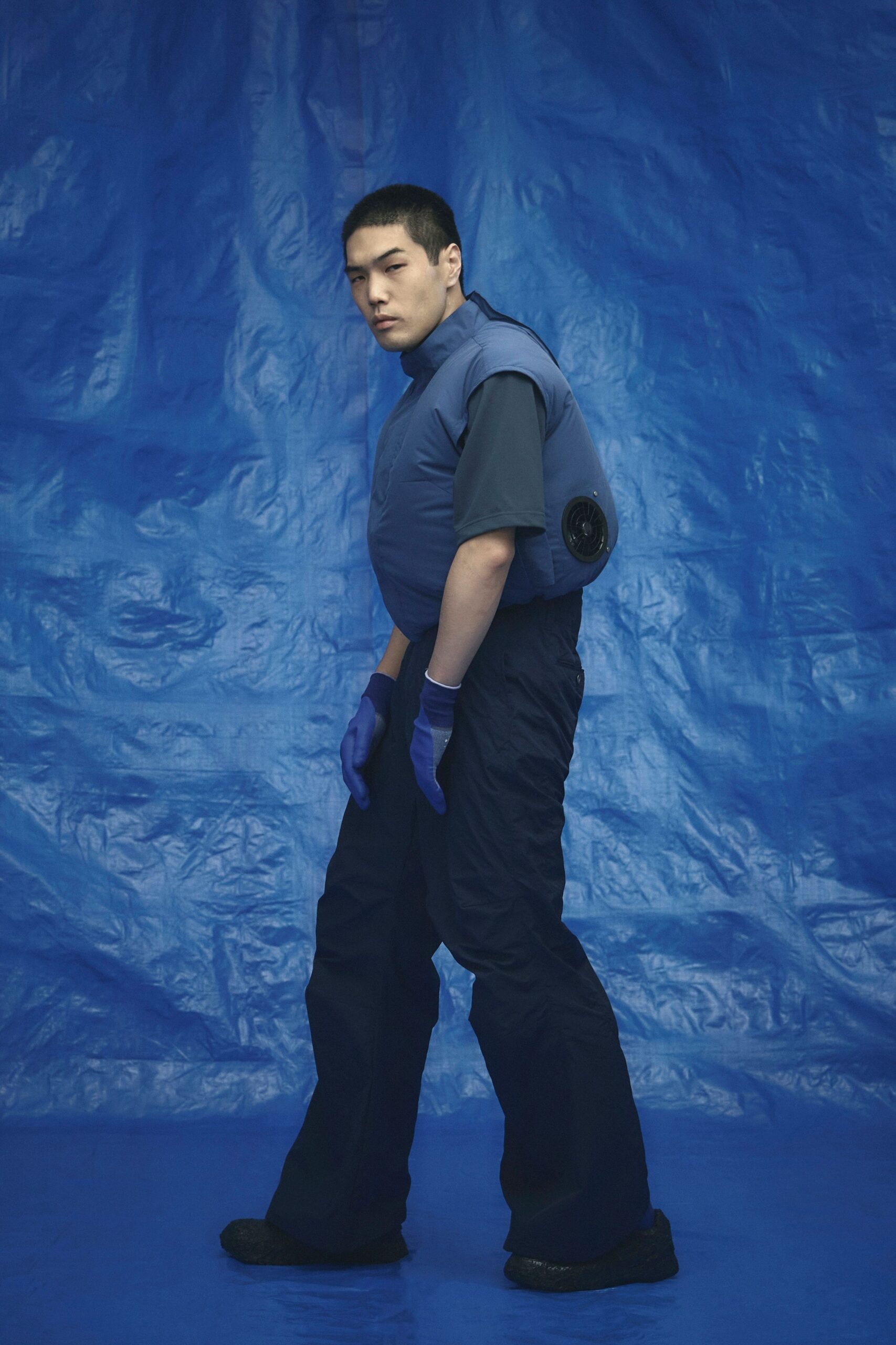 gray neoprene fitted top with blue cargo pants