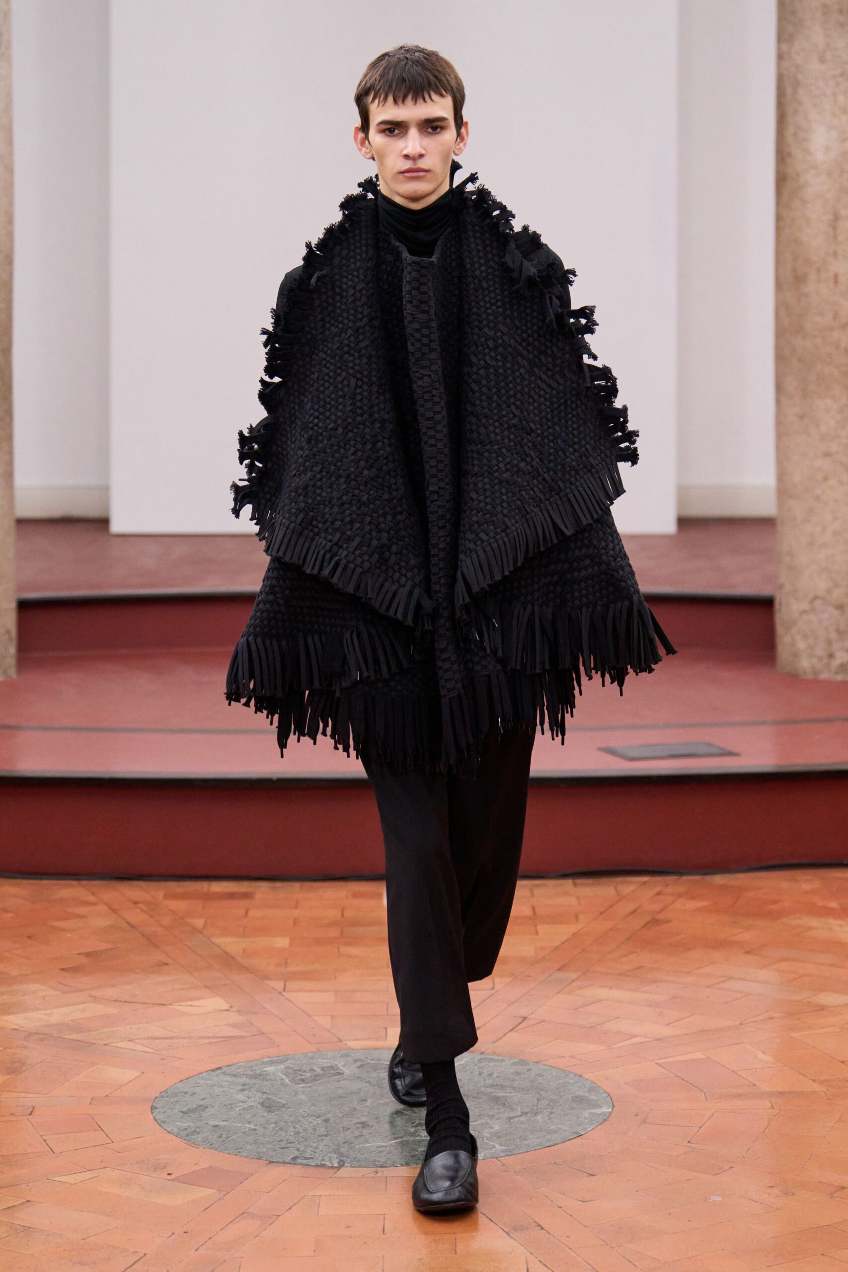 black wool poncho with fringes