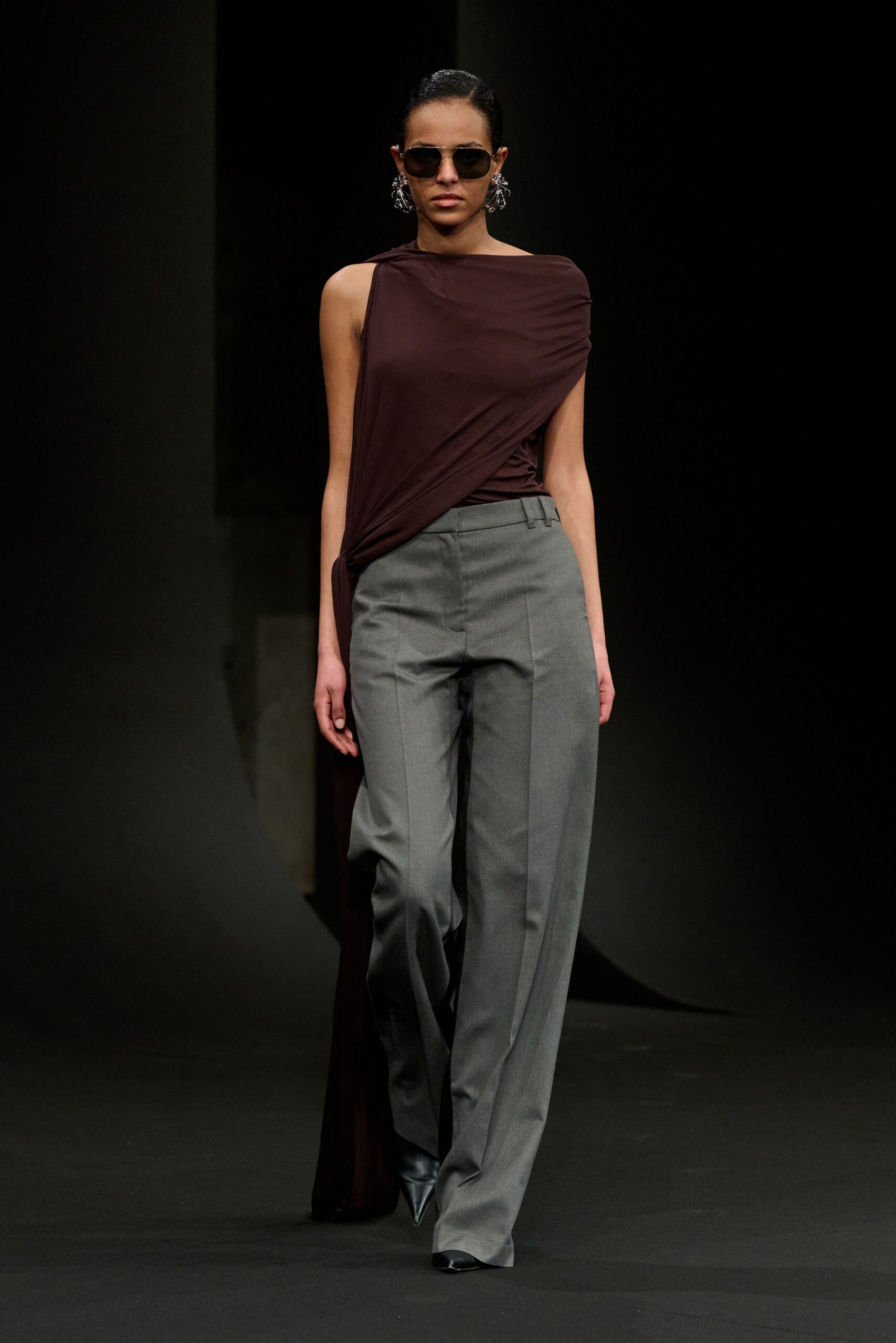 brown silk fitted top with gray pants