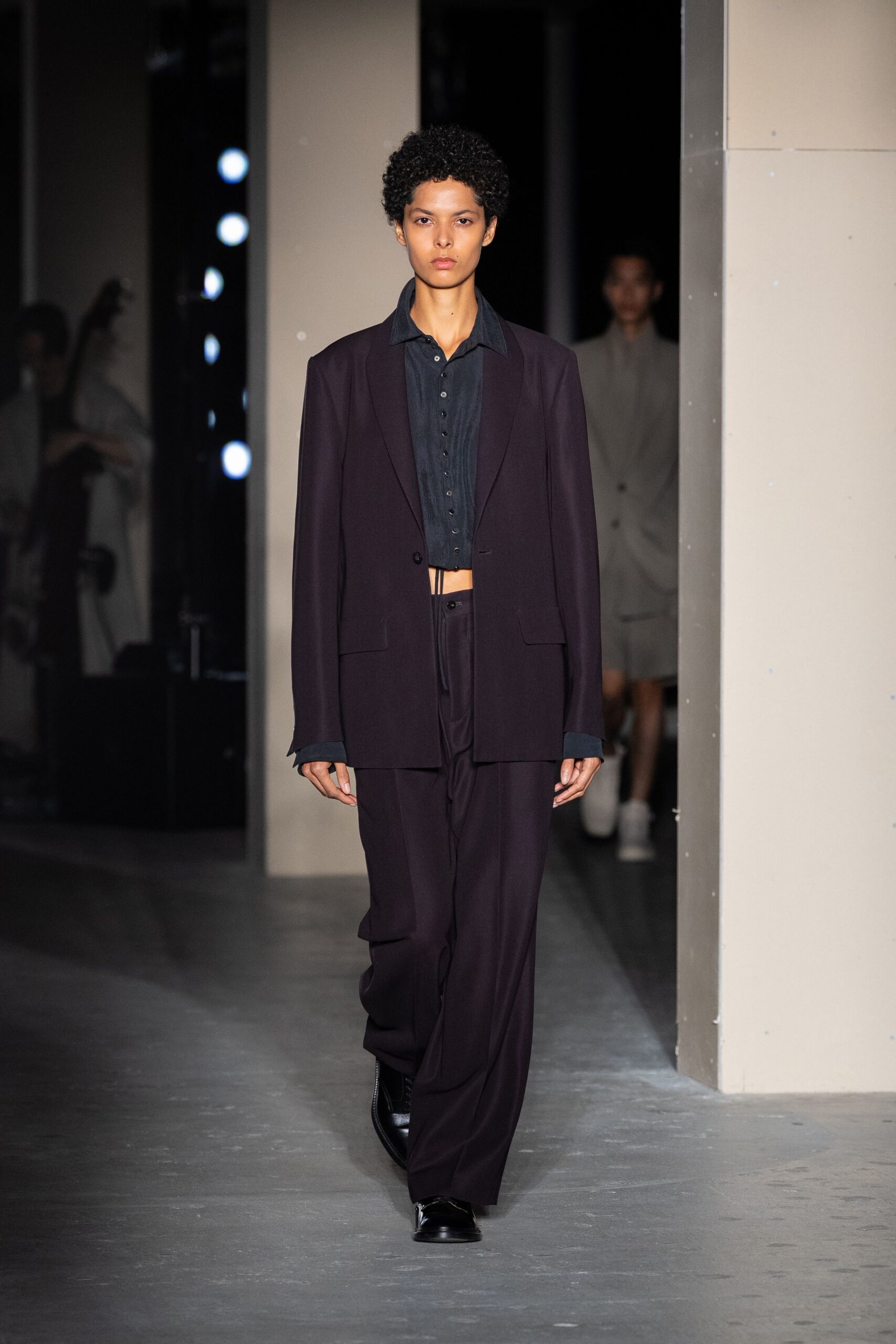 black tailored blazer with relaxed pants