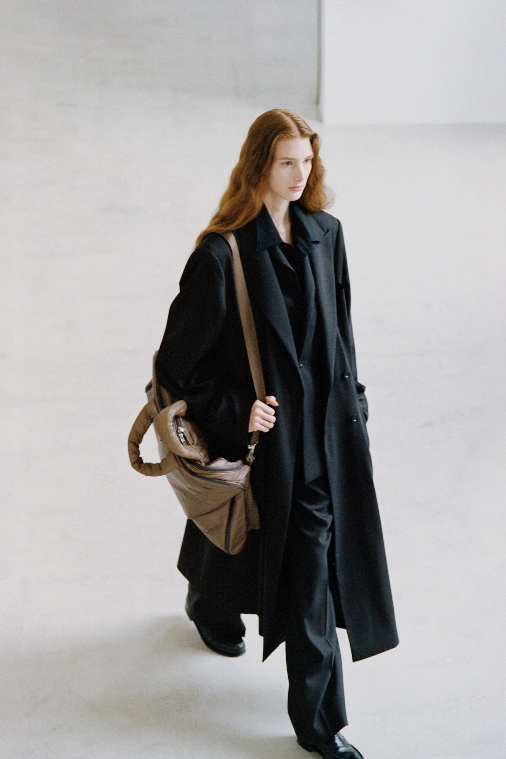 black oversized coat with tailored pants