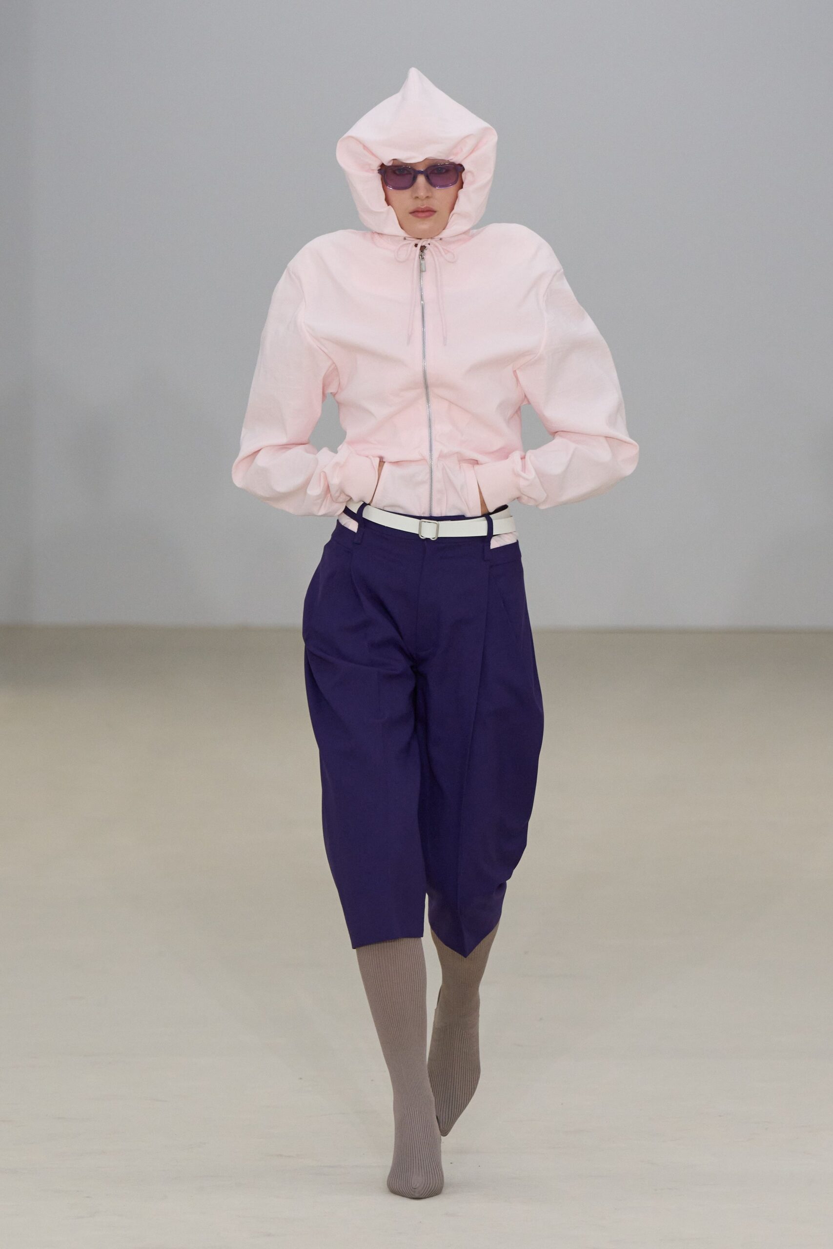 pink fitted jacket with blue pants