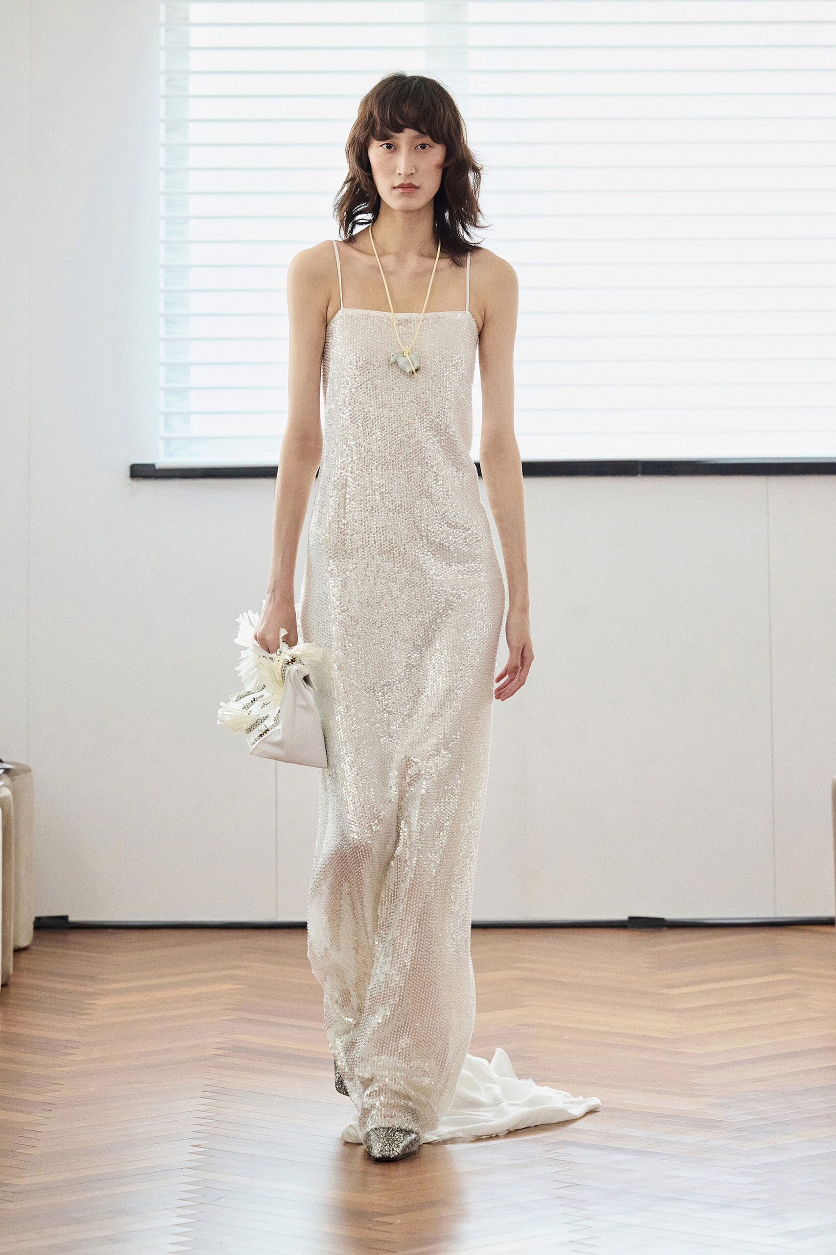 white sequin sleeveless v-neck fitted layered shiny gown