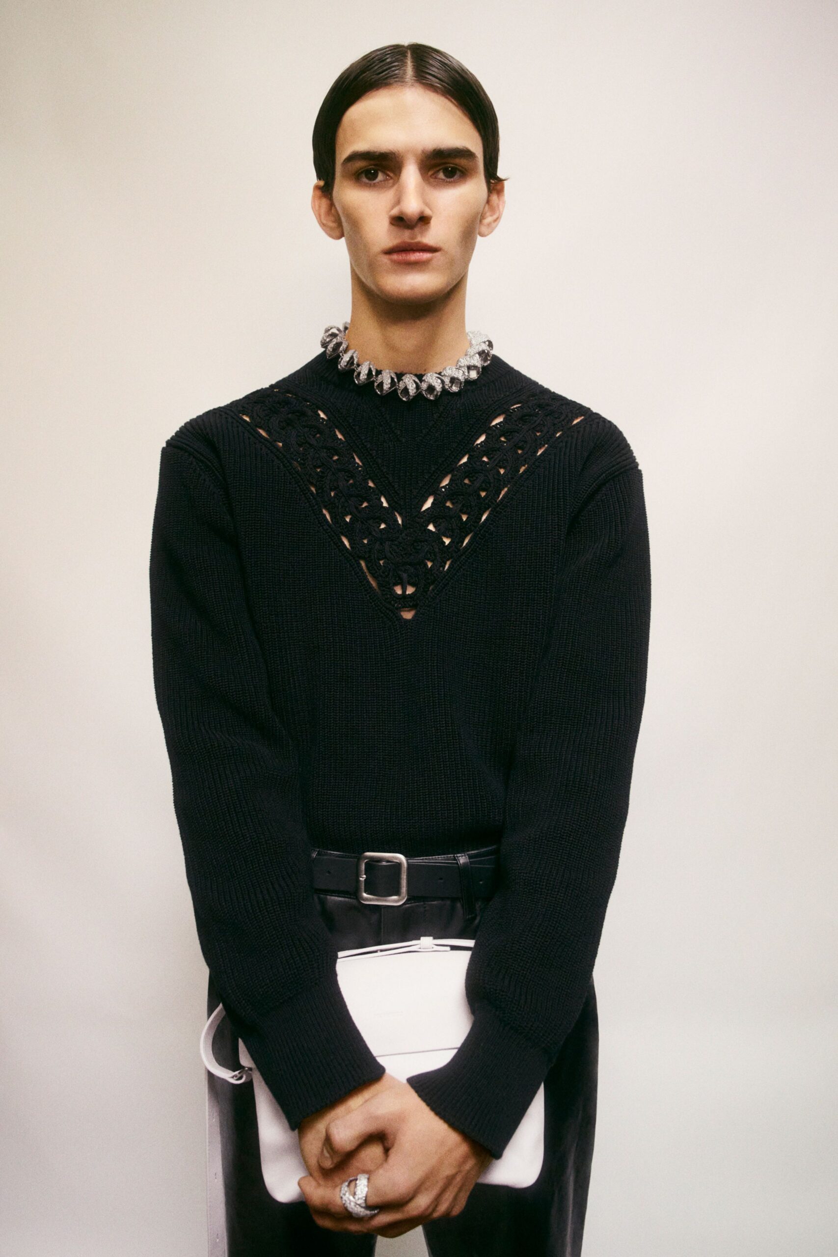black fitted sweater and pants