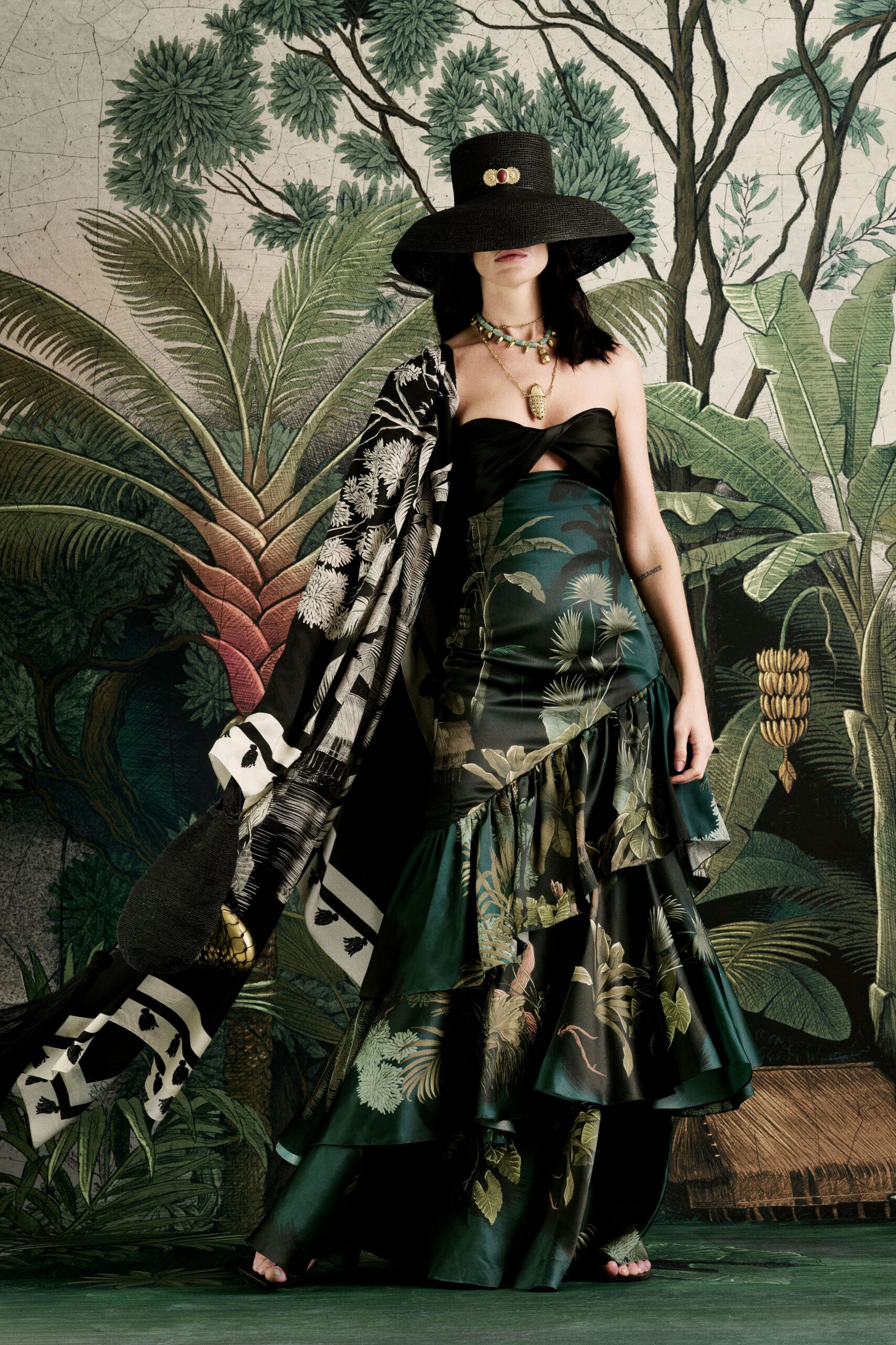 green silk strapless fitted flared layered maxi gown