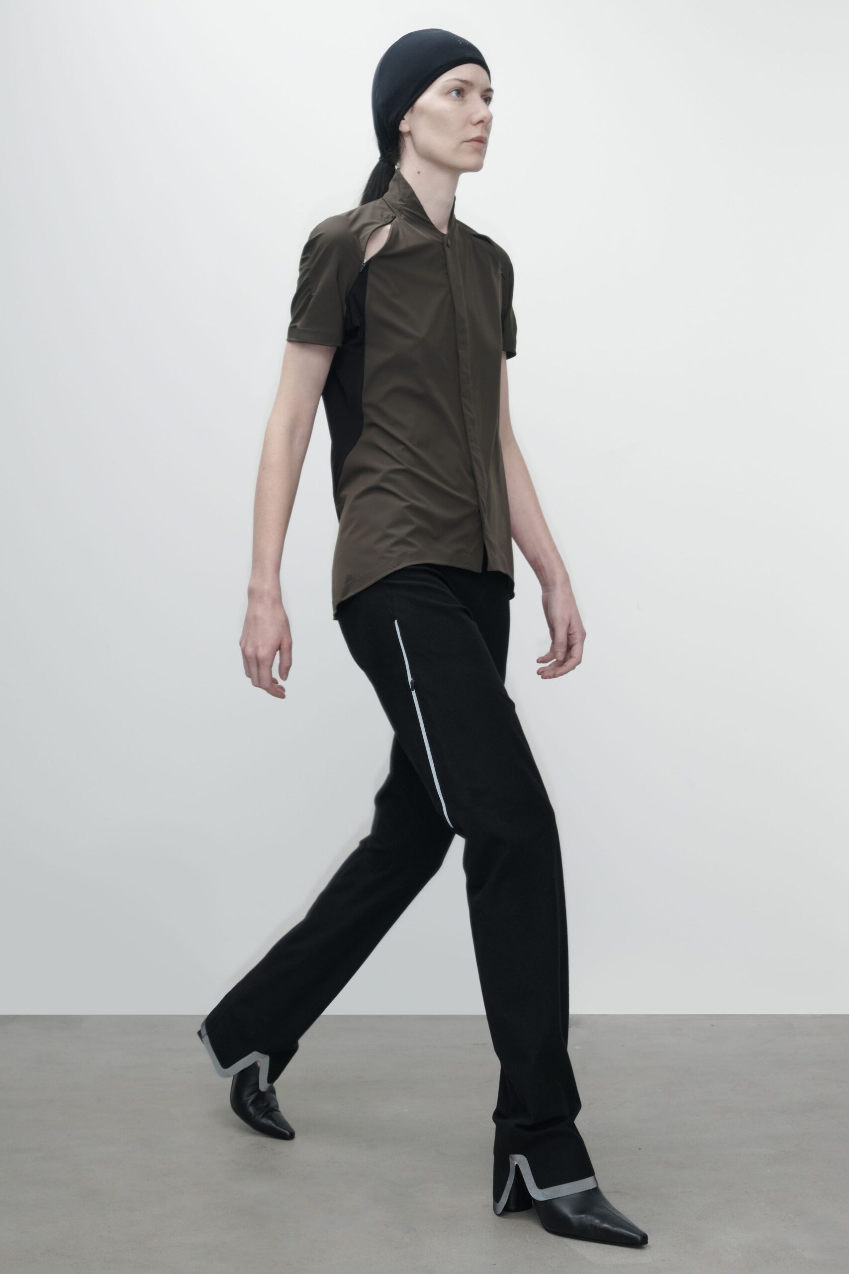 brown fitted shirt with black pants
