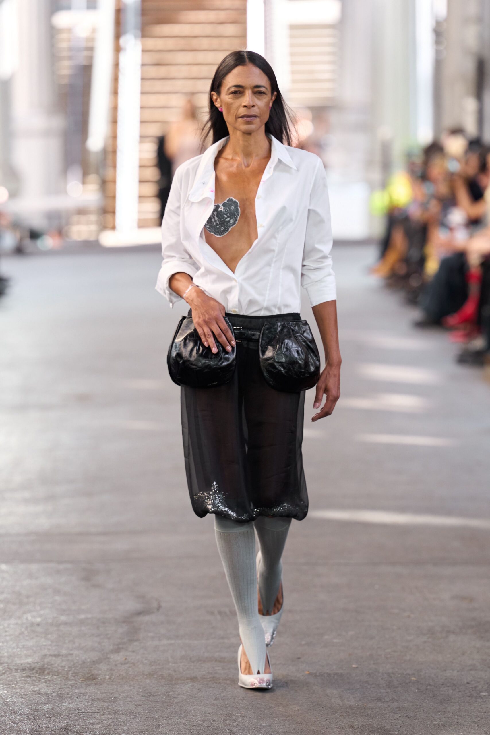 white relaxed shirt black skirt