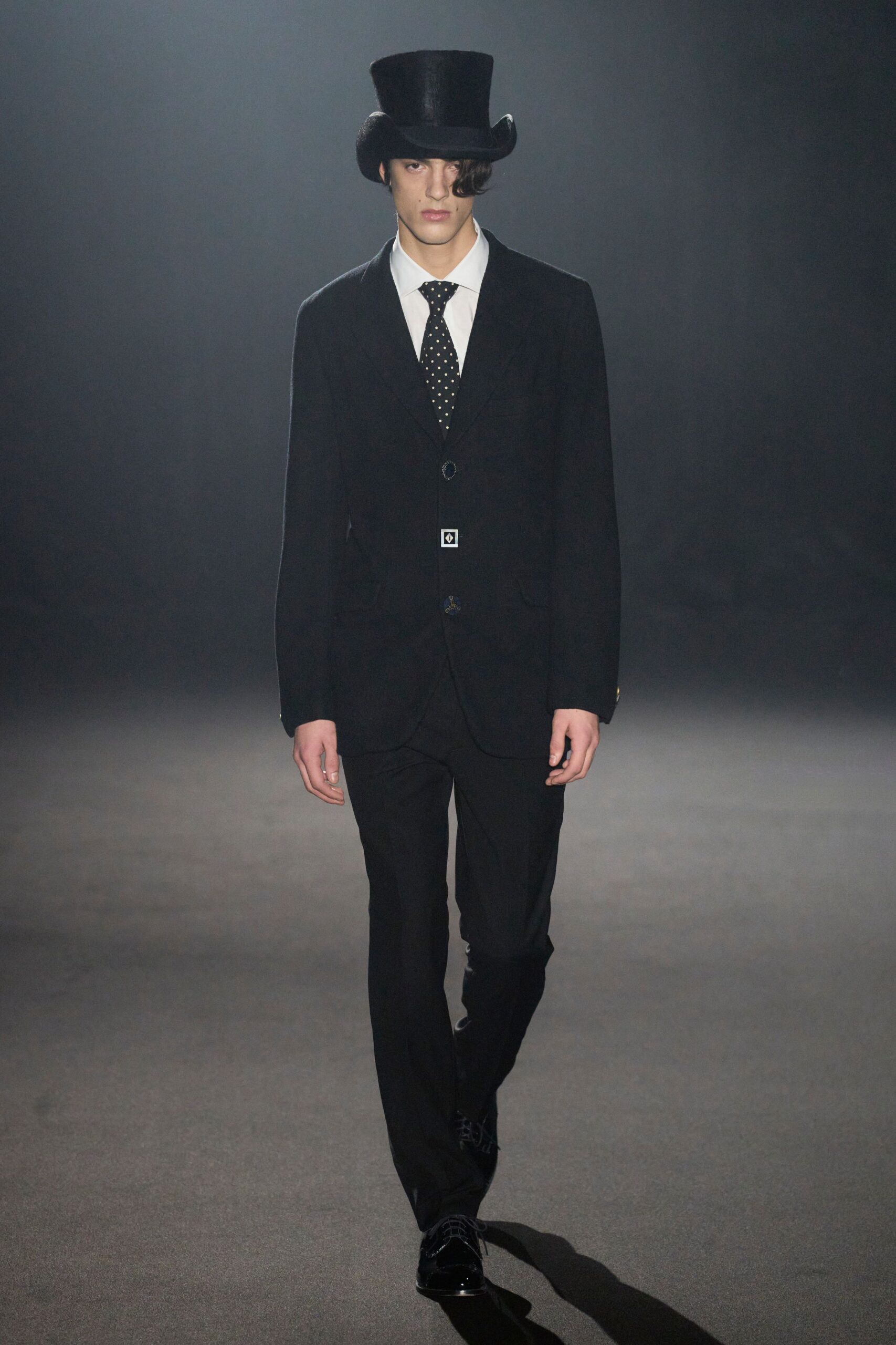 black tailored suit with top hat