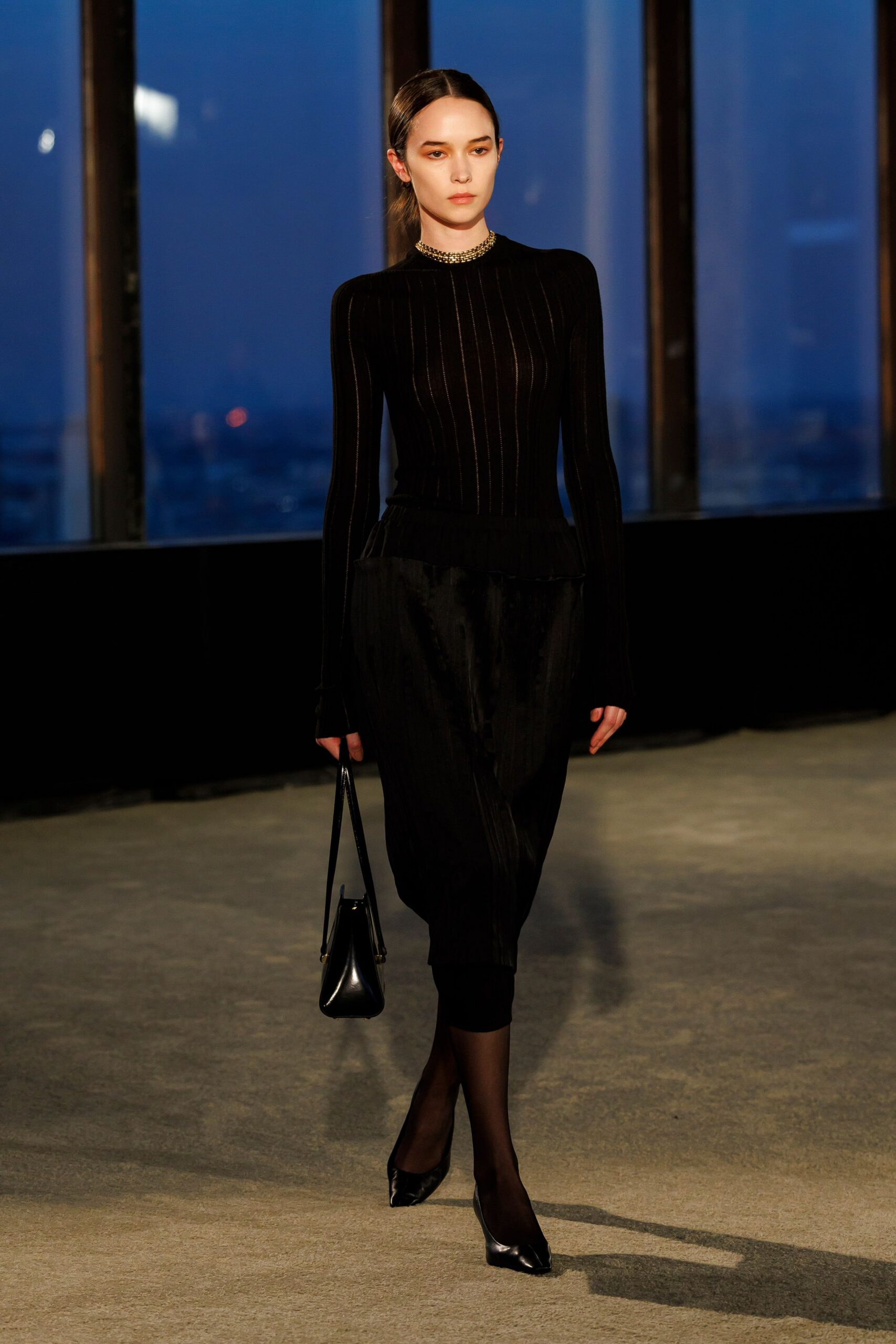 black fitted top with relaxed pants