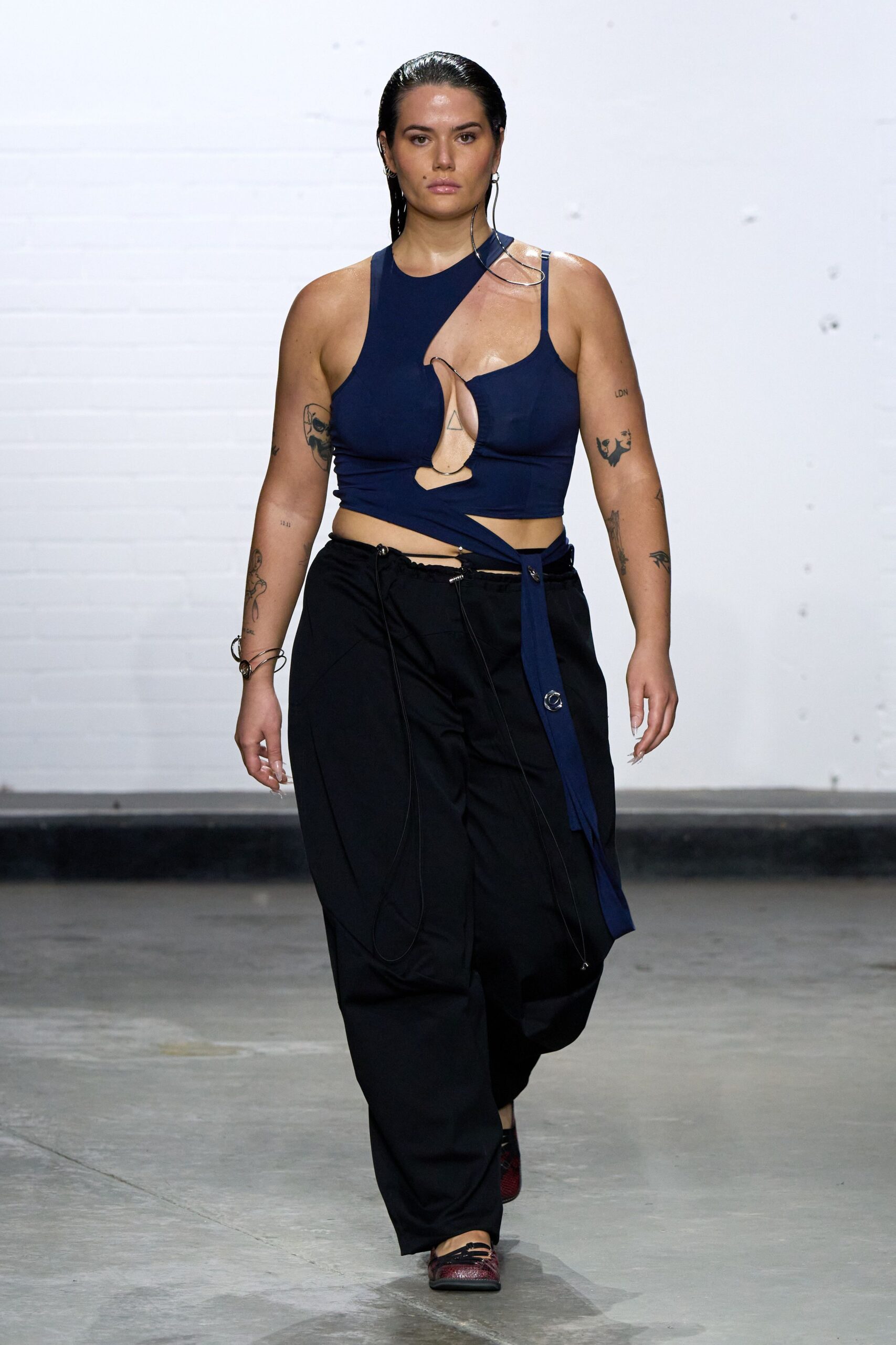 blue fitted top black relaxed pants
