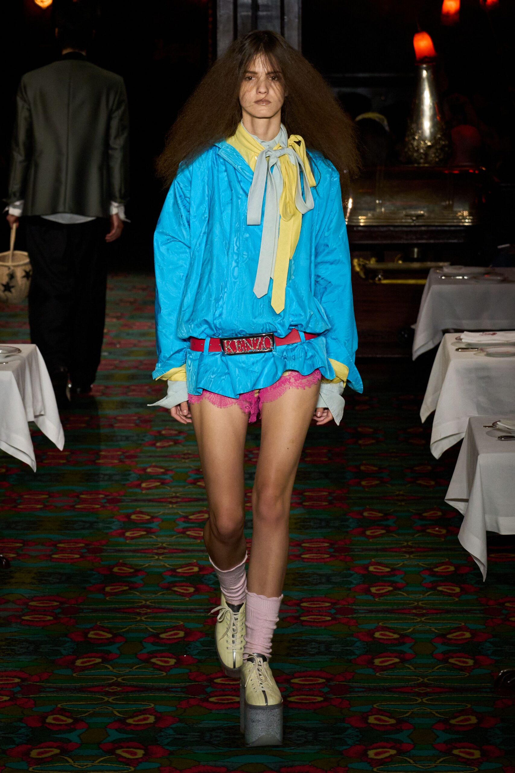 blue jacket yellow shirt pink shorts