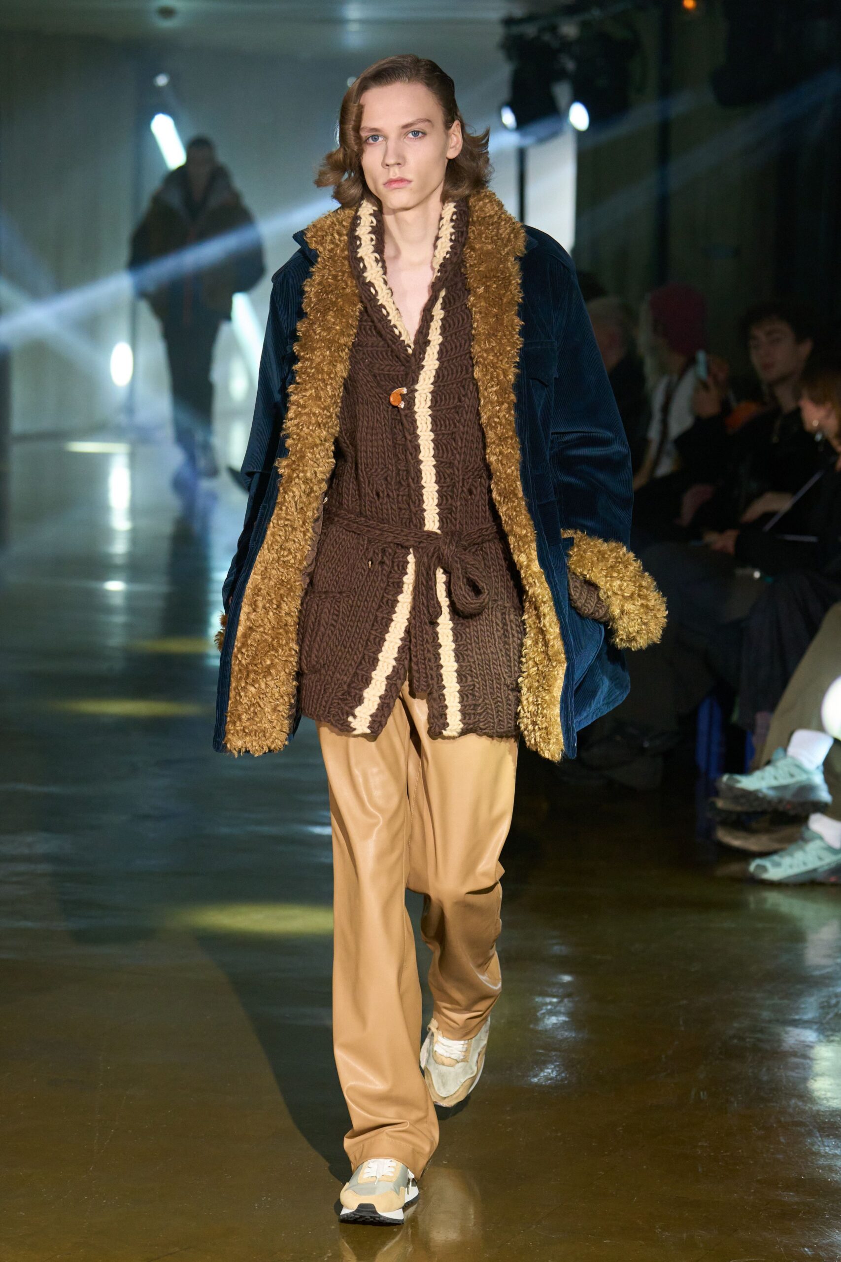 blue velvet coat brown sweater beige pants