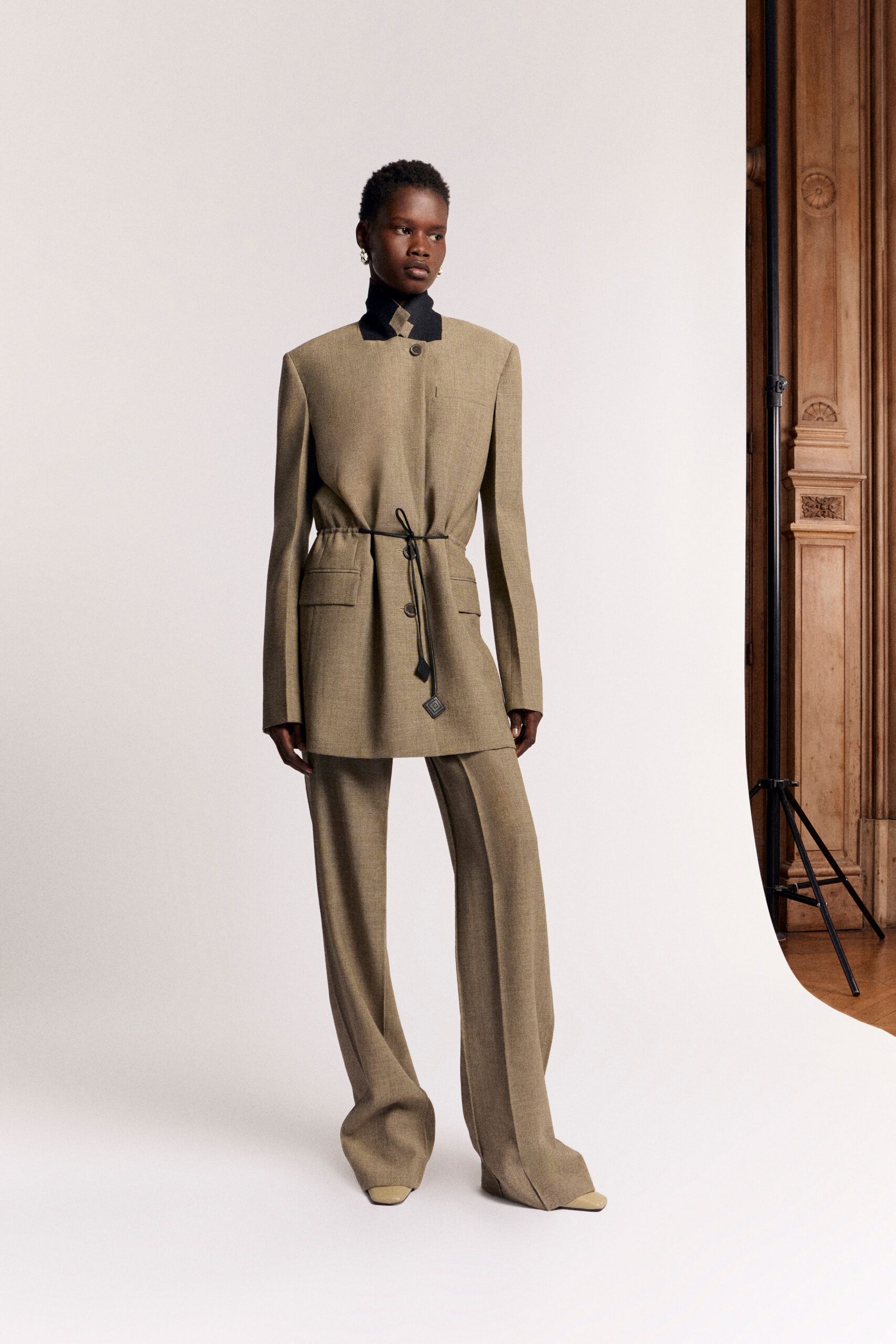 beige wool long-sleeve collared tailored zippered pockets blazer