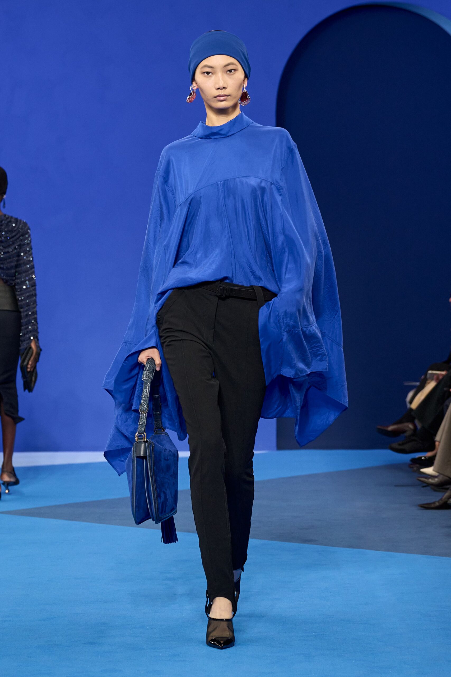blue silk long-sleeve high-neck relaxed draped flowing top