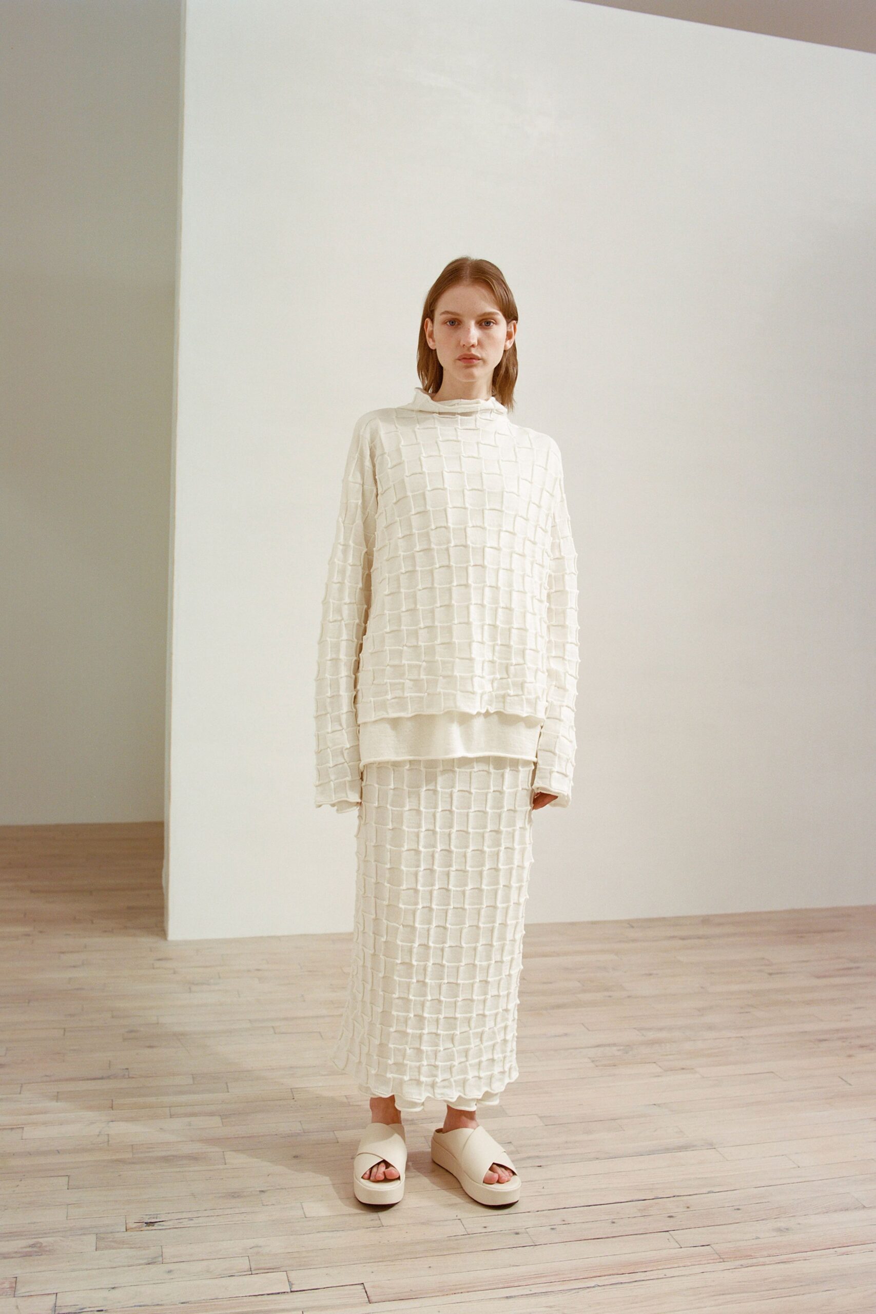 white cotton fitted textured midi skirt