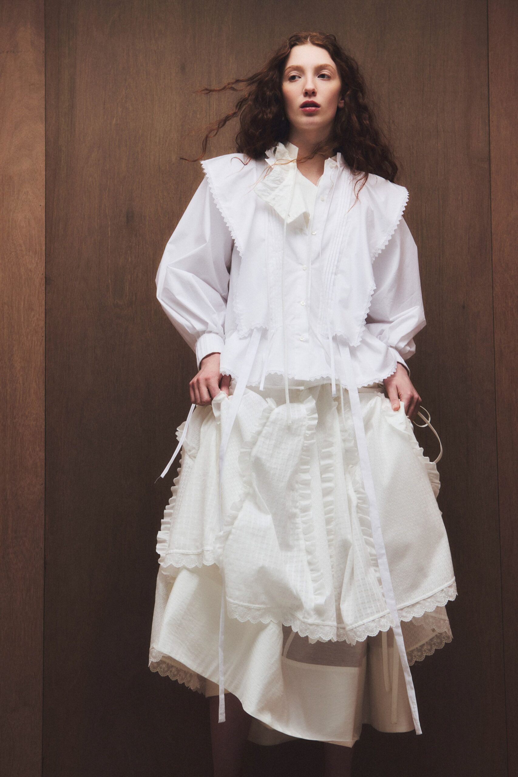 white cotton long-sleeve collared relaxed ruffled blouse