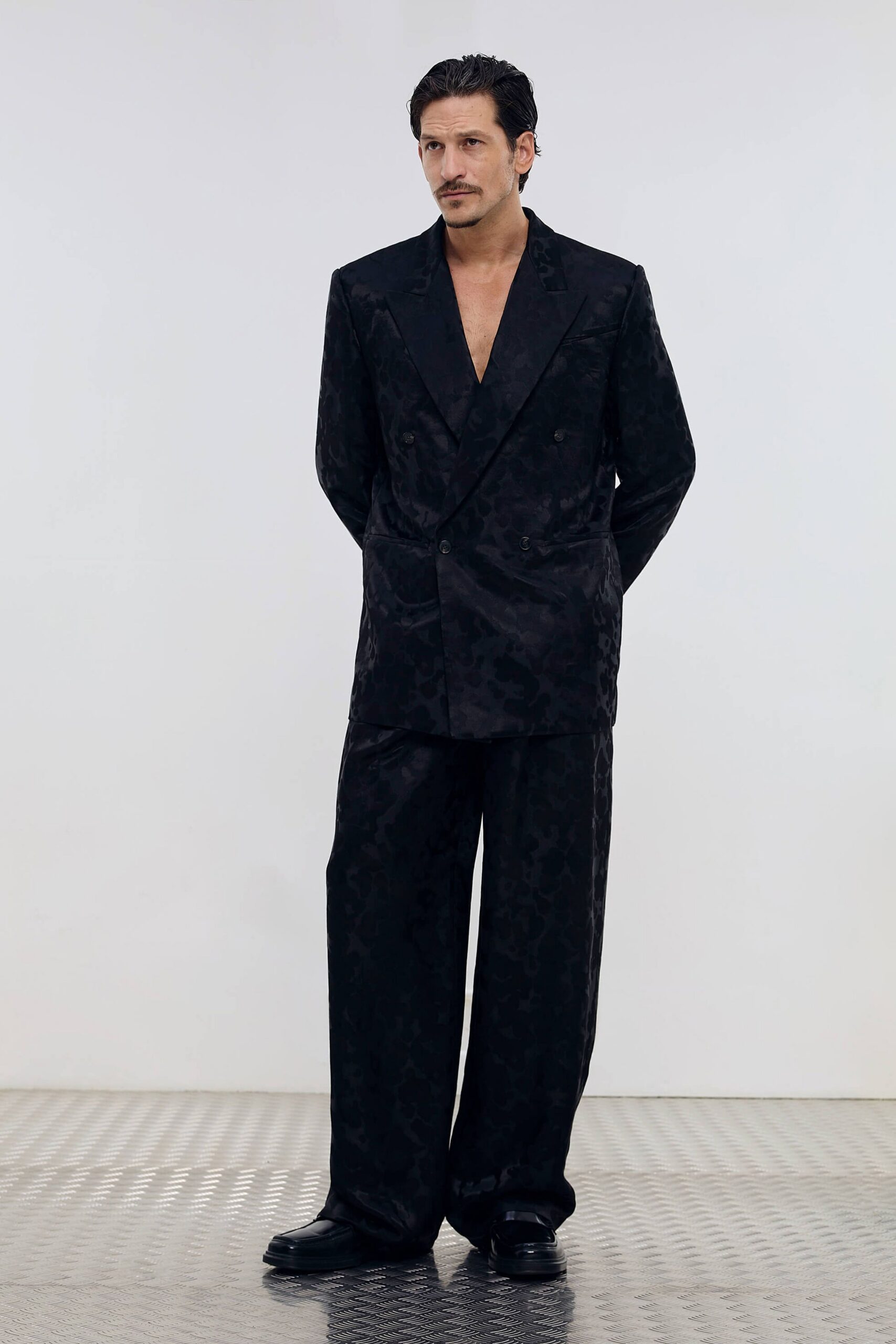 black velvet long-sleeve collared relaxed textured suit