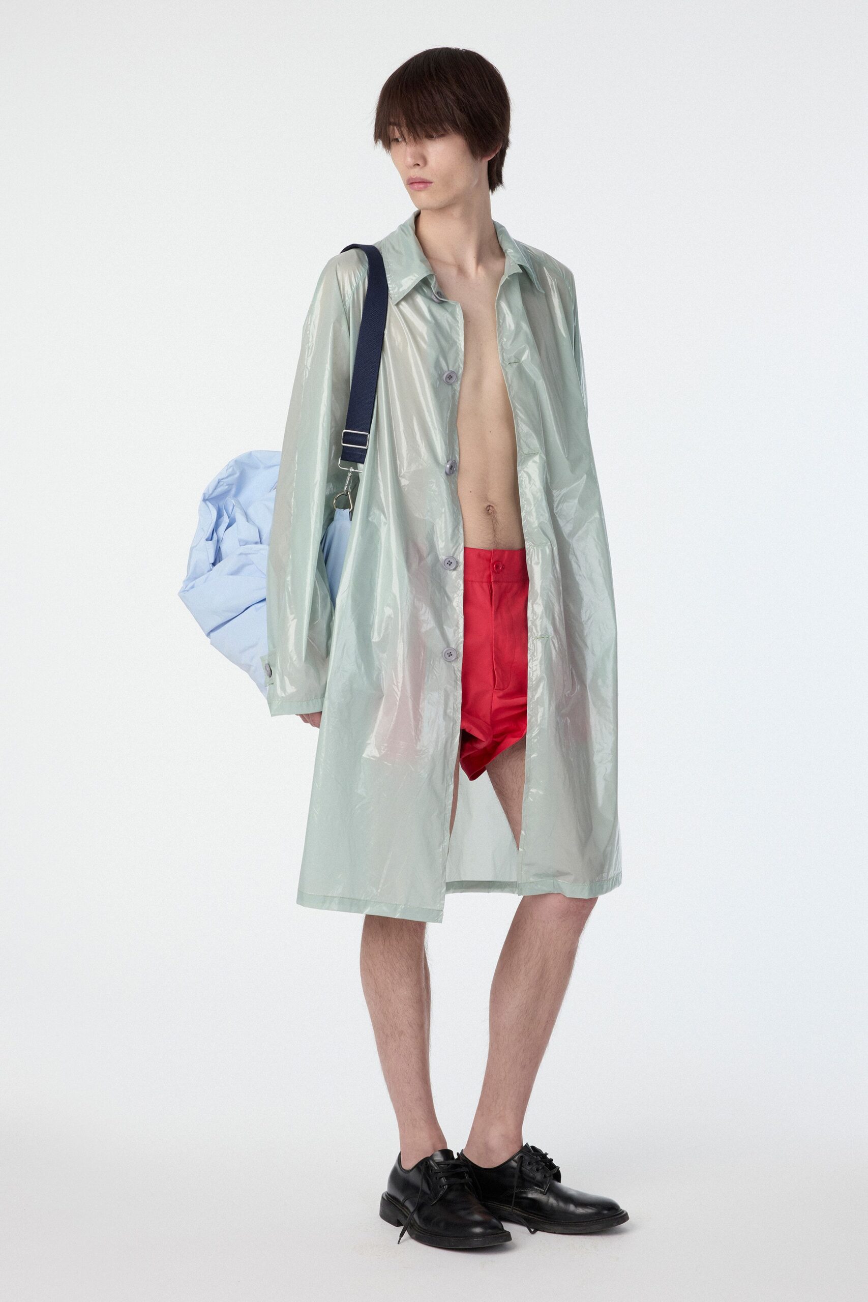 green vinyl long-sleeve collared relaxed buttoned shiny coat
