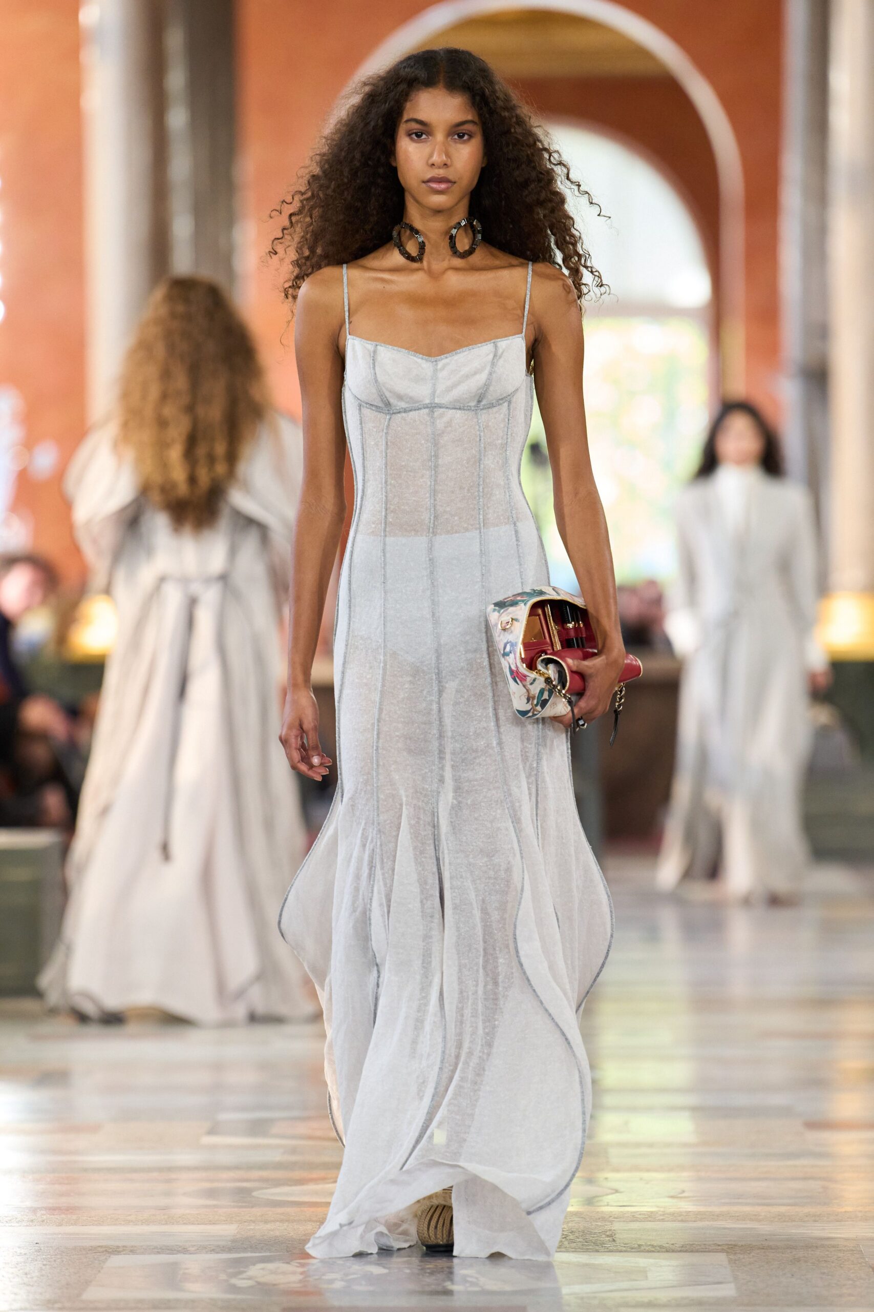 white sheer flowing gown