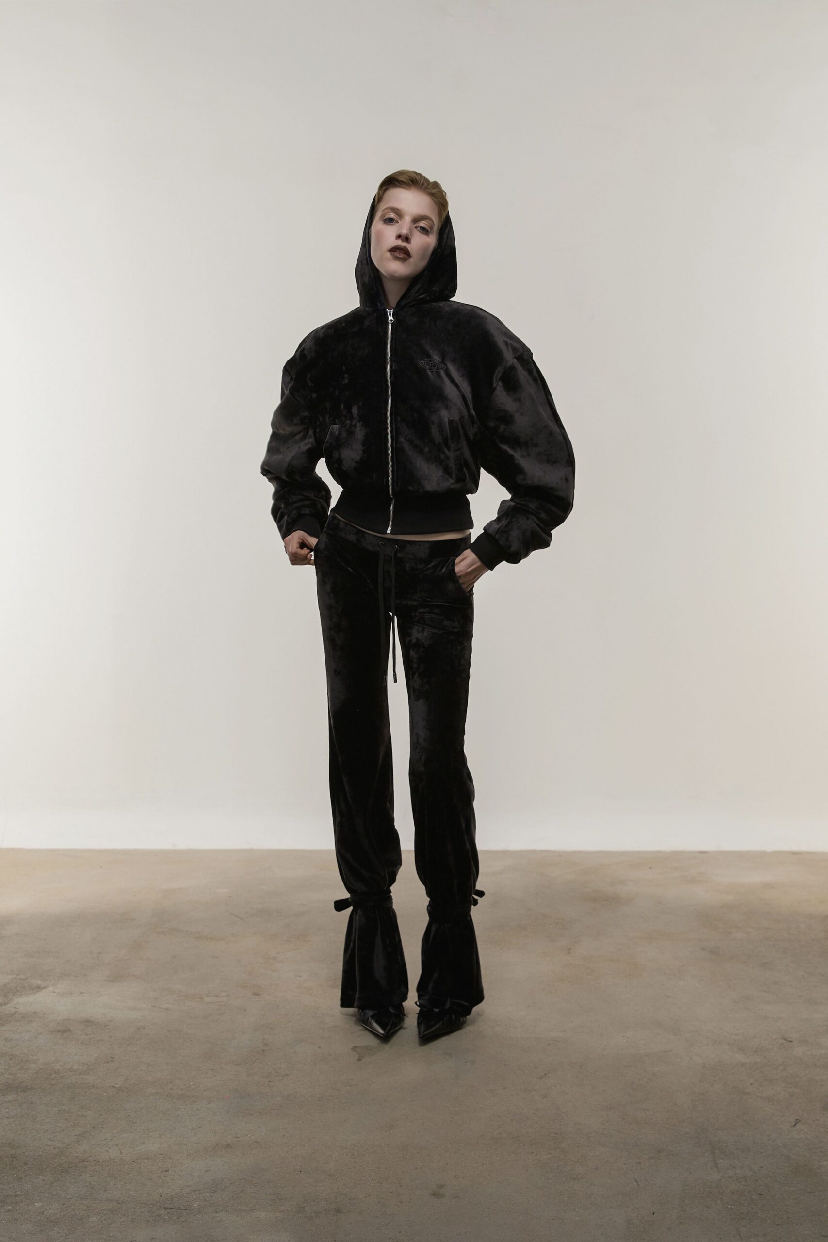 black velvet oversized hoodie and flared pants