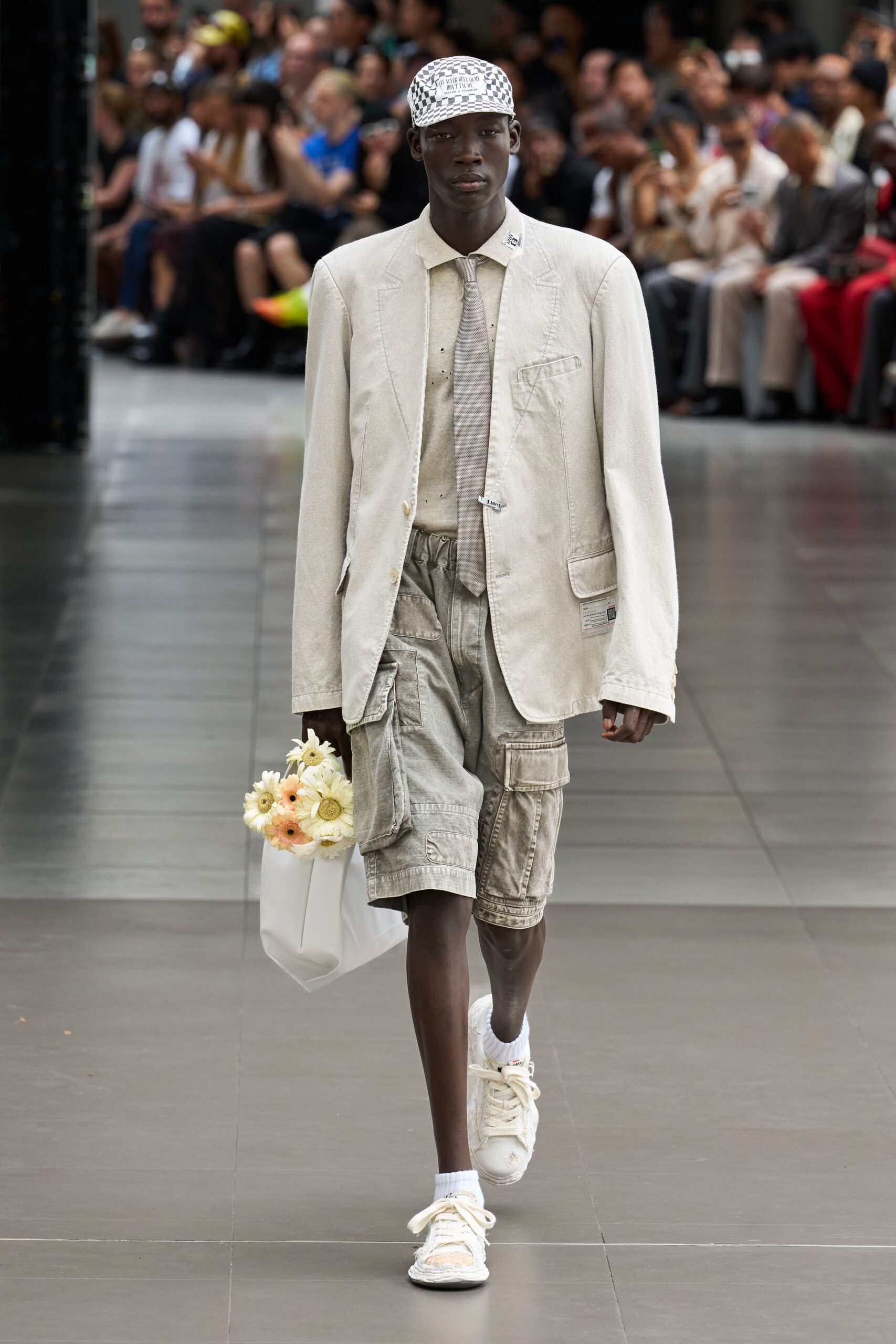 beige tailored blazer with gray cargo shorts