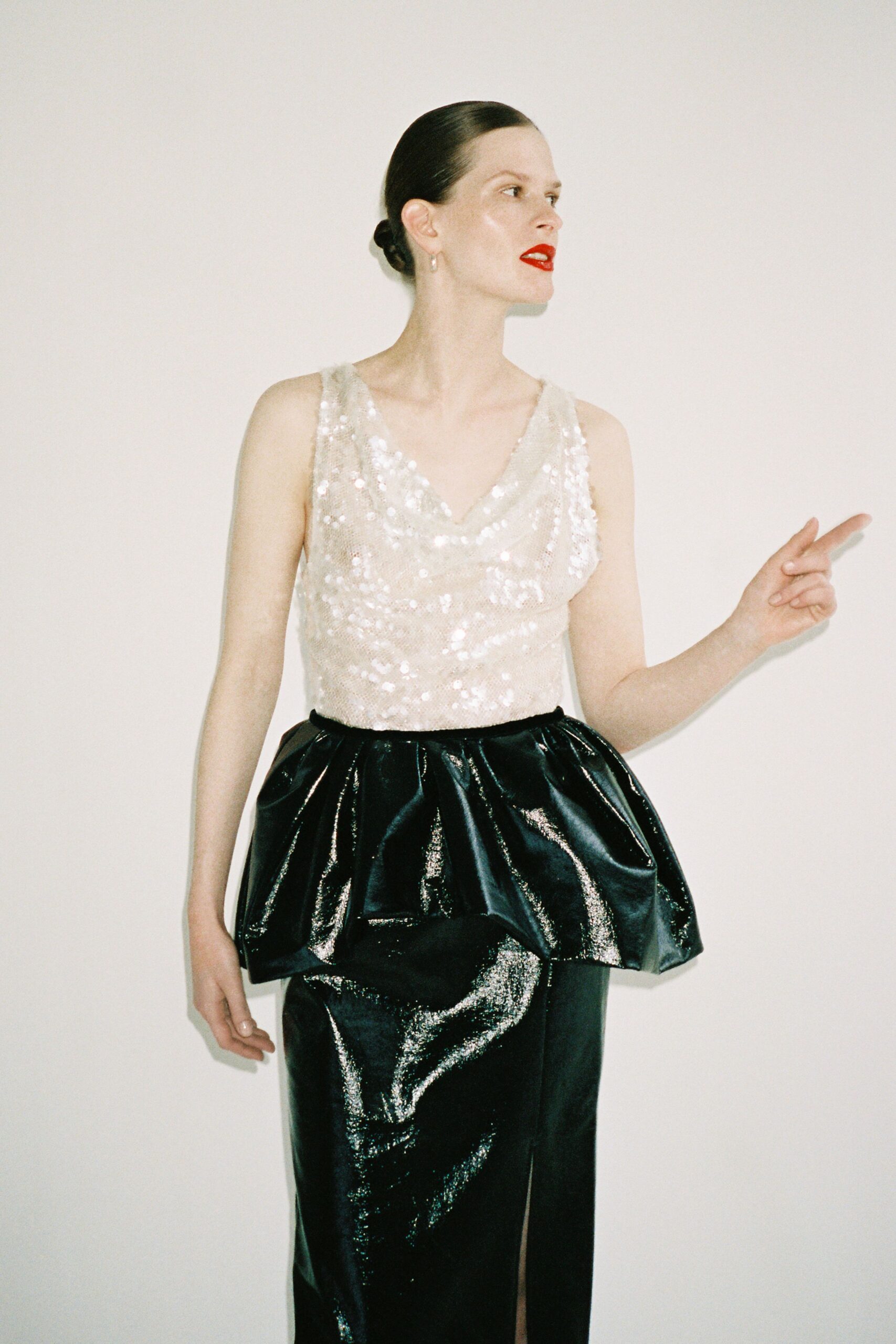 white silk sleeveless v-neck fitted sequined shiny top