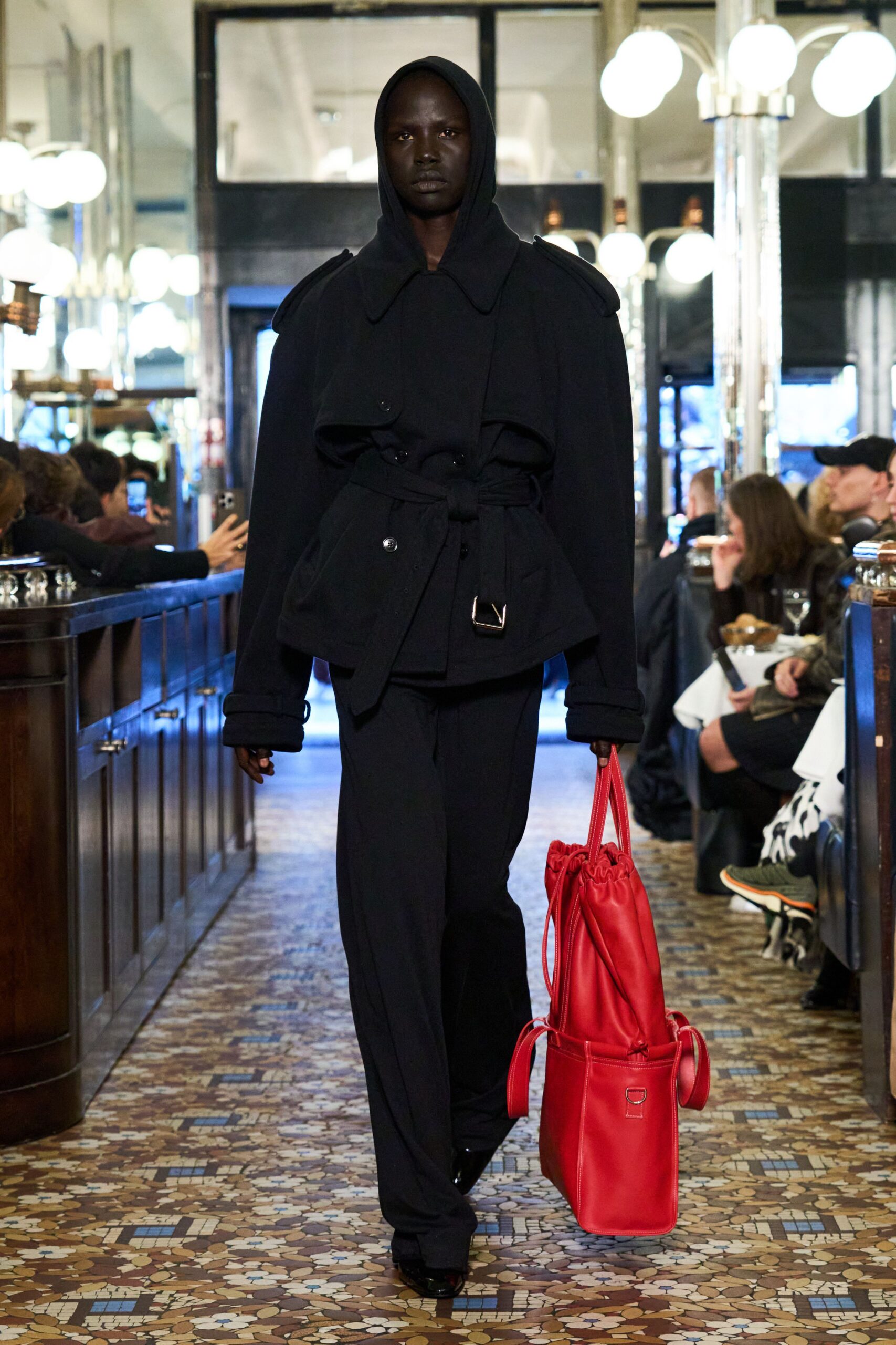black wool relaxed jacket with red bag