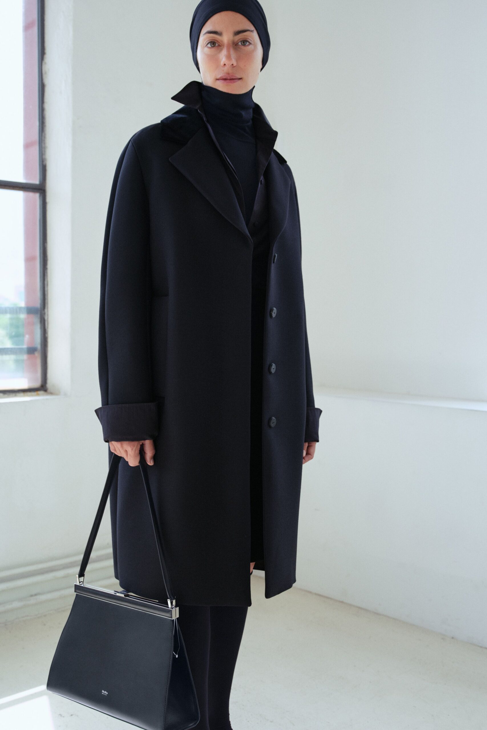 black wool coat and dress