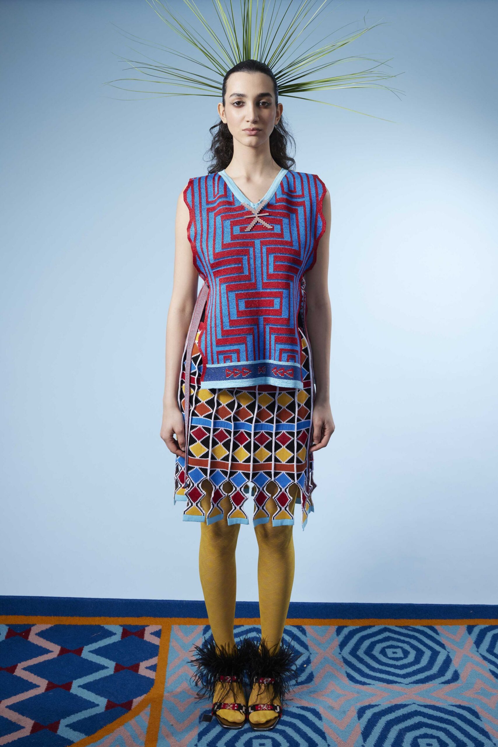 red cotton sleeveless v-neck fitted printed top